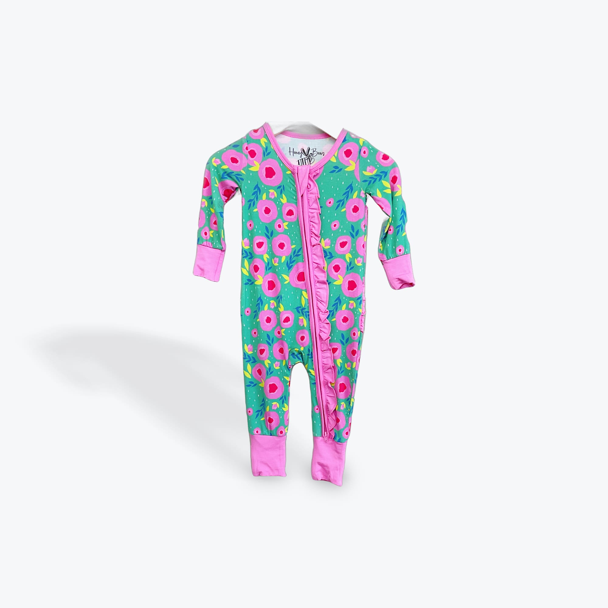 Floral Zippy Floral Zippy - Cozy & Cute Zip-Up Onesies- The Honeybow Collection. Wrap your little one I comfort and style with these adorable zip-up onesies. Available in multiple sizes listed below- please specify your preferred size in order notes at checkout. -Sizes available are 6-12 months 12-18 months