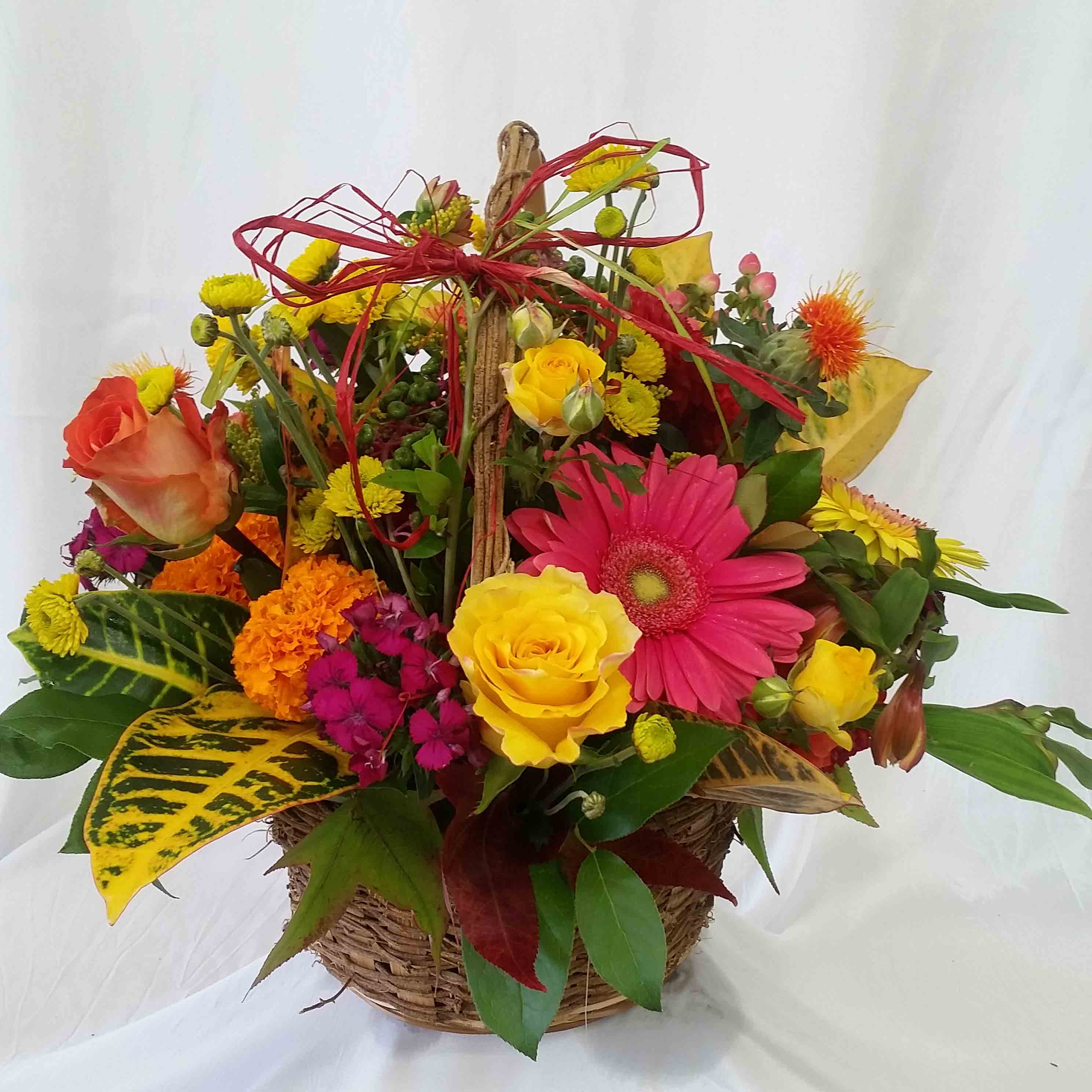 Autumn Cheer (F-211) Autumn Cheer (F-211) - Gerbera daisies, Roses, Alstroemerias, Button mums and more in a basket