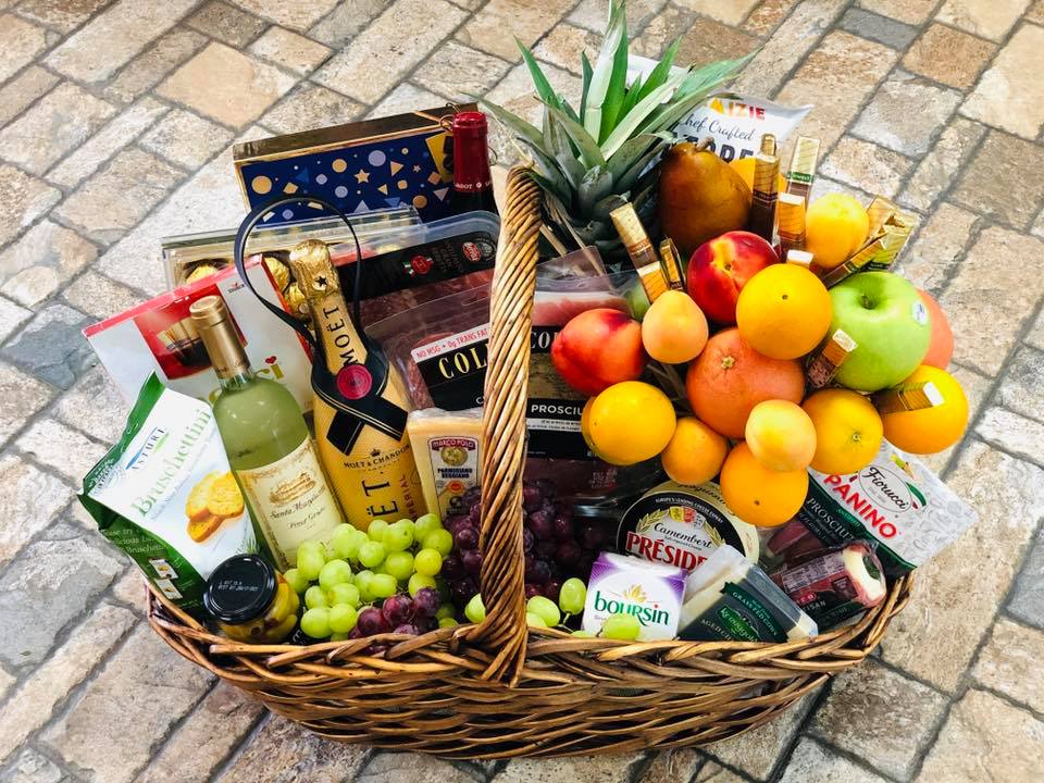 Ultimate Gourmet Basket Ultimate Gourmet Basket - When you want to give the very best, give this gourmet gift basket and you won't go wrong. This large basket will be positively stuffed with goodies, a perfect gift for friends, family, clients, or anyone who would like to be truly spoiled!  **PLEASE NOTE WE DO NOT SUPPLY ALCOHOL OR WINE, THESE ITEMS MUST BE BROUGHT IN BY THE CUSTOMER TO BE INCLUDED IN THE BASKET**