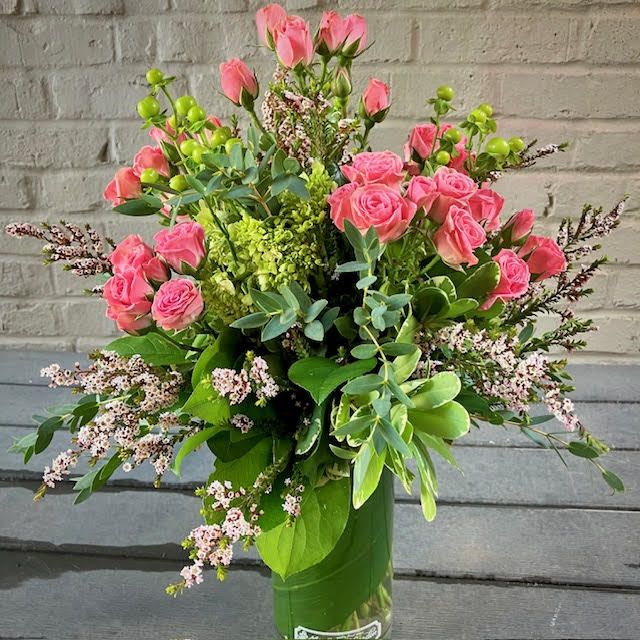 Autumn Rouge - This lovely bouquet features a beautiful combination of Sweetheart Roses, Hydrangeas, and Hypericum Berries. Perfect to bring a glimmer of sweetness and light to any home or office space, the Autumn Rouge is sure to spread joy and delight!