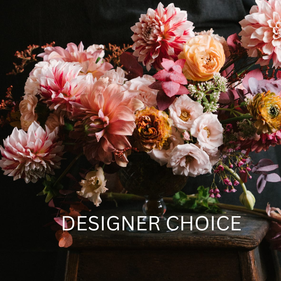 Premium Designer's Choice - Can’t decide? Let us surprise you! Our designers hand-select the freshest seasonal blooms and create a one-of-a-kind arrangement full of beauty, color, and charm. Each piece is thoughtfully designed with a balance of elegance and creativity, making it the perfect gift for any occasion. When you choose Designer’s Choice, you’re giving a truly unique bouquet—crafted with love, just for you.