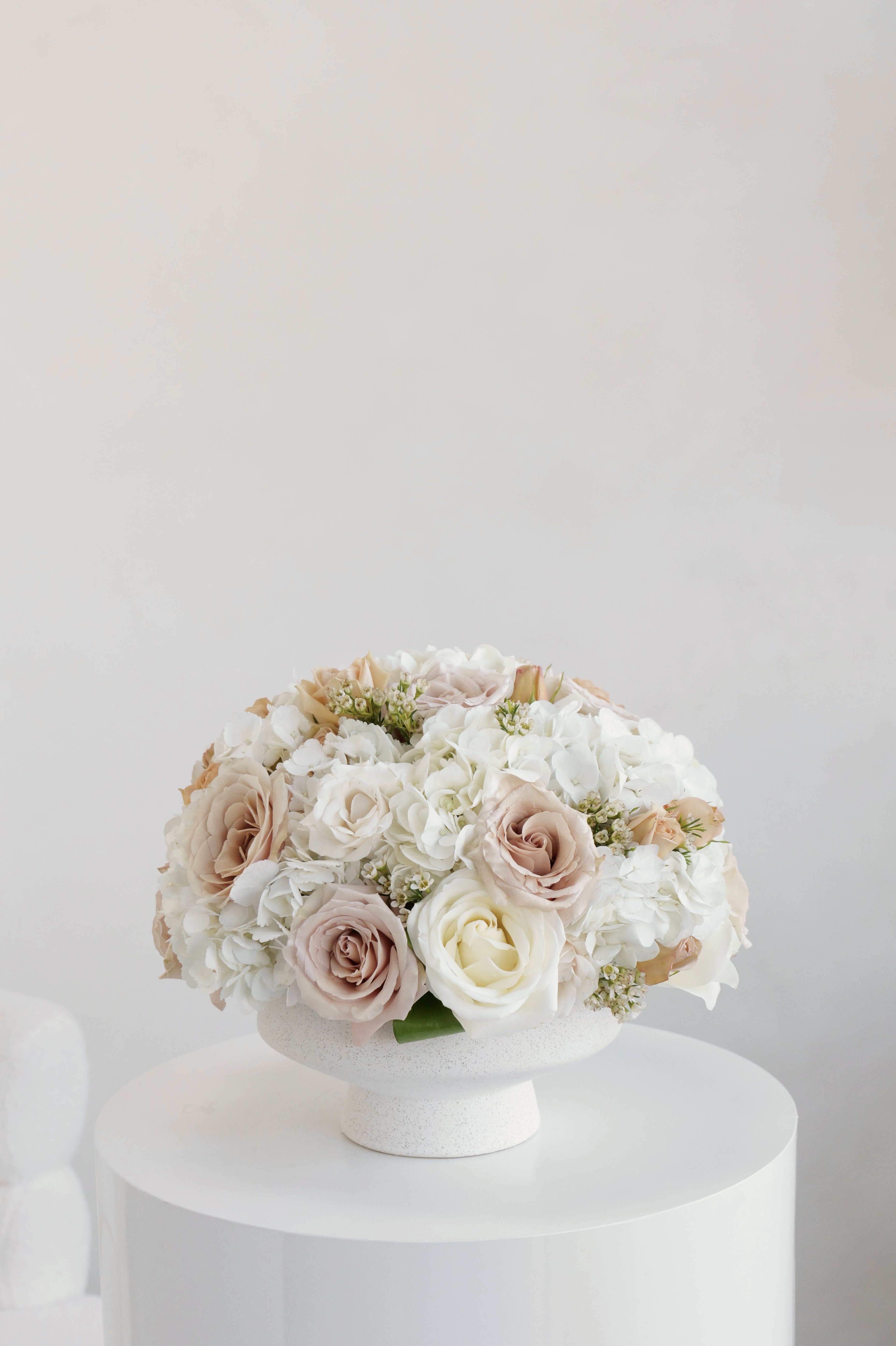 Mila - A graceful blend of roses and hydrangeas, artfully arranged for a timeless and elegant look.