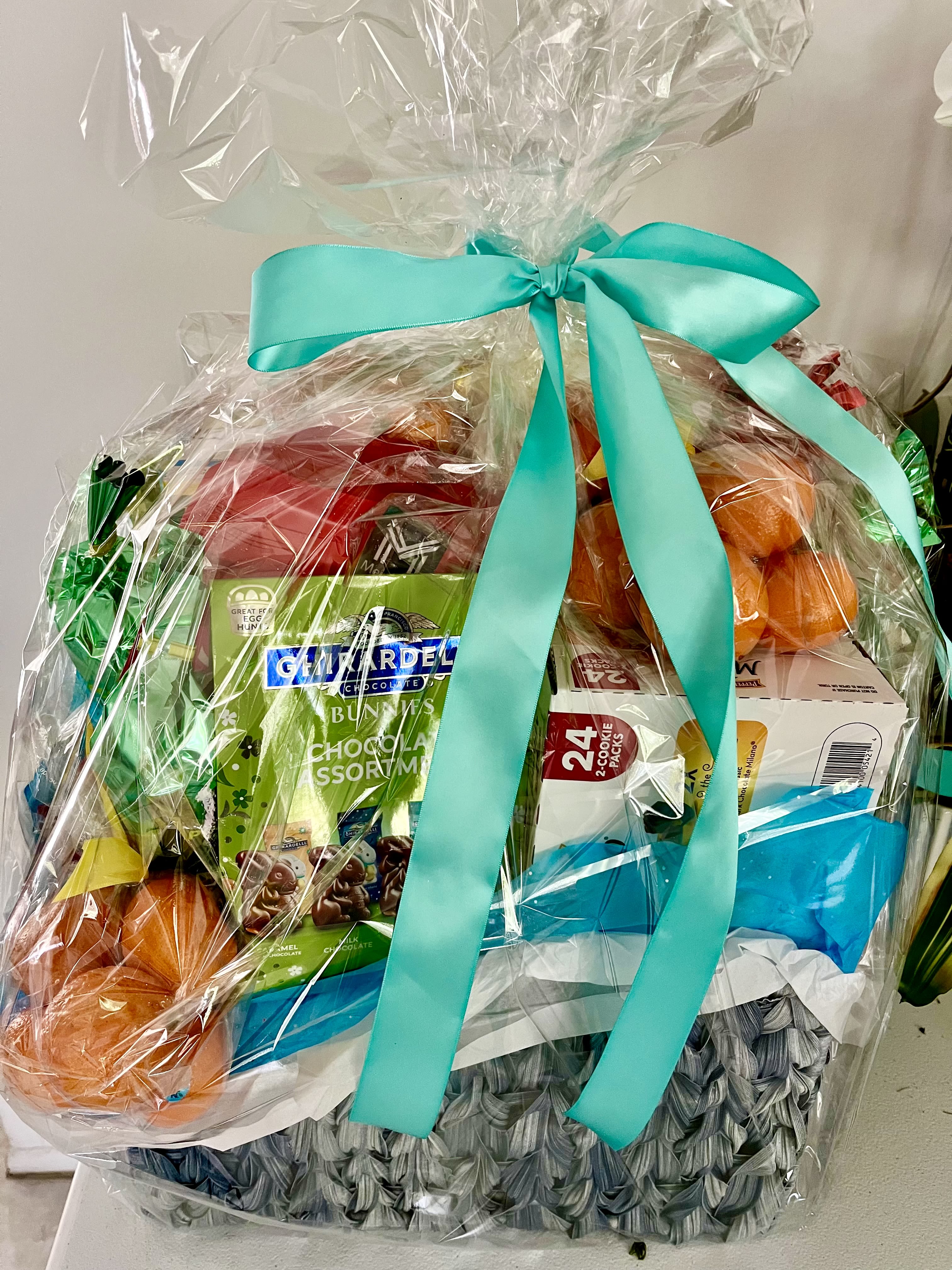 Treats Basket Treats Basket - A customizable basket filled with your favorite sweet and savory treats- perfect for any occasion! Our treats are carefully selected and beautifully arranged. Personalize it to suit any taste or celebration.