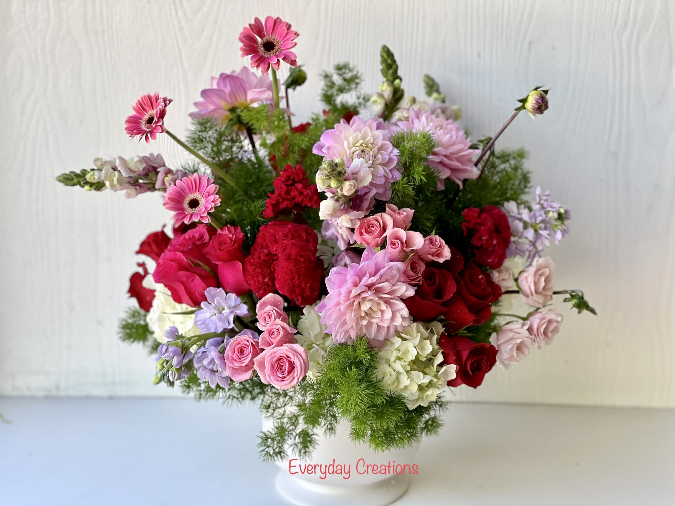 EC46- Sweetheart Bouquet - Color outside the lines with this incredible  flowers! Pops of hot pink, pale pink lavonder,white  and bright green spill over the sides of a white cylinder. It's an exciting, heartfelt gesture to send a stylish friend, a colorful girlfriend or anyone who needs perking up.It is  a wonderful gift for Mother's day, Birthday , Valentin's Day,and Anniversary. 
