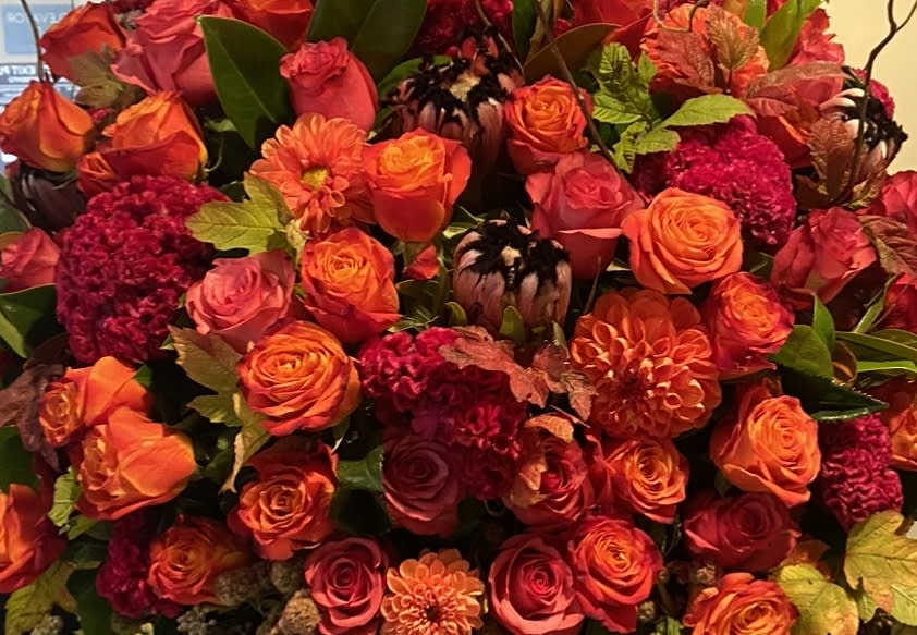 Fall arrangement Designer's Choice - A beautiful flower arrangement with seasonal flowers in Fall colors.