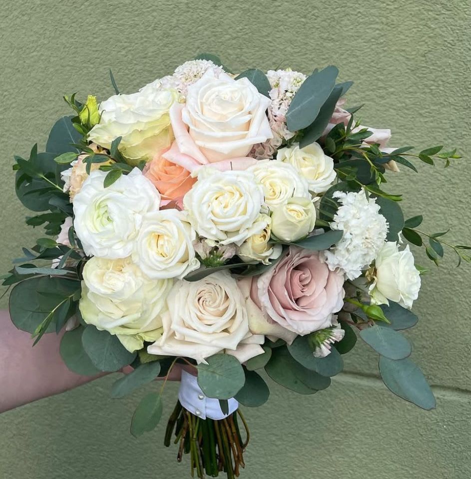 Large HOCO/Prom Bouquet - Large Bouquet – Perfect for Homecoming &amp; Prom Make your special night unforgettable with this elegant mini bouquet, designed to complement your look without overwhelming it. Featuring choice or blooms or premium roses, accented with lush greenery, this bouquet is the perfect accessory for homecoming, prom, or any formal occasion. Personalize your bouquet with your choice of ribbon color to match your dress or theme, adding a touch of custom detail that ties it all together. Delicate, timeless, and perfectly sized for carrying, this petite rose bouquet is the ideal finishing touch for your night to remember.  Please list your floral and ribbon color preference in the notes and we will make it to match!  Please check out our Add-On option for custom HOCO Ribbons!  