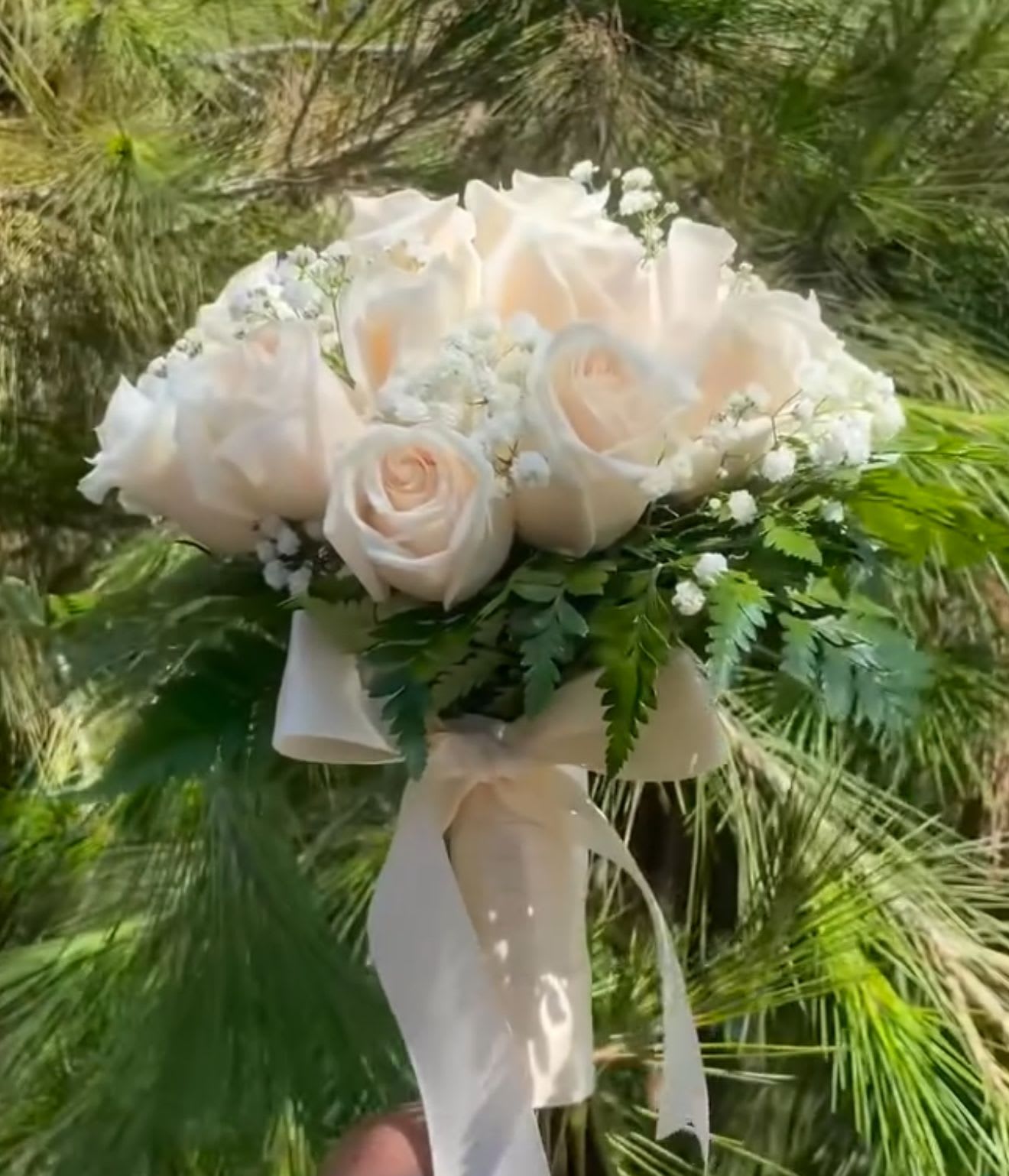 Medium HOCO/PROM Bouquet - Medium  Rose Bouquet – Perfect for Homecoming &amp; Prom Make your special night unforgettable with this elegant mini bouquet, designed to complement your look without overwhelming it. Featuring choice or blooms or premium roses, accented with lush greenery, this bouquet is the perfect accessory for homecoming, prom, or any formal occasion. Personalize your bouquet with your choice of ribbon color to match your dress or theme, adding a touch of custom detail that ties it all together. Delicate, timeless, and perfectly sized for carrying, this petite rose bouquet is the ideal finishing touch for your night to remember.  Bouquet will be delivered approximately as pictured. Please list your floral and ribbon color preference in the notes and we will make it to match!  Please check out our Add-On option for custom HOCO Ribbons!  