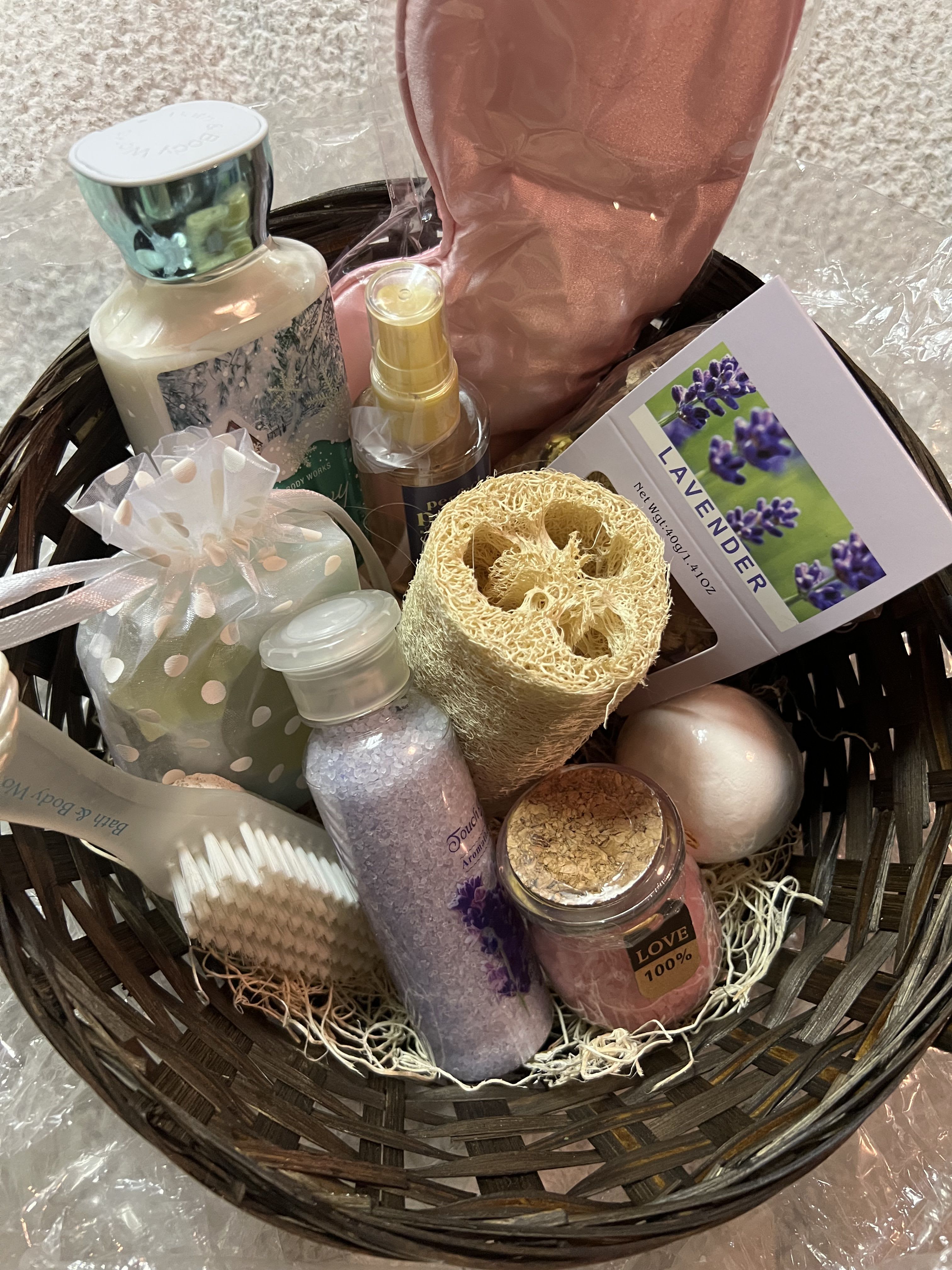 12 Piece Spa Basket - 12 Piece Spa gift set Basket contains: 1-Spa Mask, 1 Lavender Potpourri (40 grams), 1 Body Lotion (8 oz.), 1 Bath bomb, 1 fragrance mist (3 oz.), 1 bar of soap, 1 pumice/brush stone, 1 Loofa, 1 Lavender bottle bath salts (7 oz.), 1 Pink Love bath salt, 1 basket and 1 card to write in and send your thoughts. Custom created. Only 1 available. Wrapped with a bow.