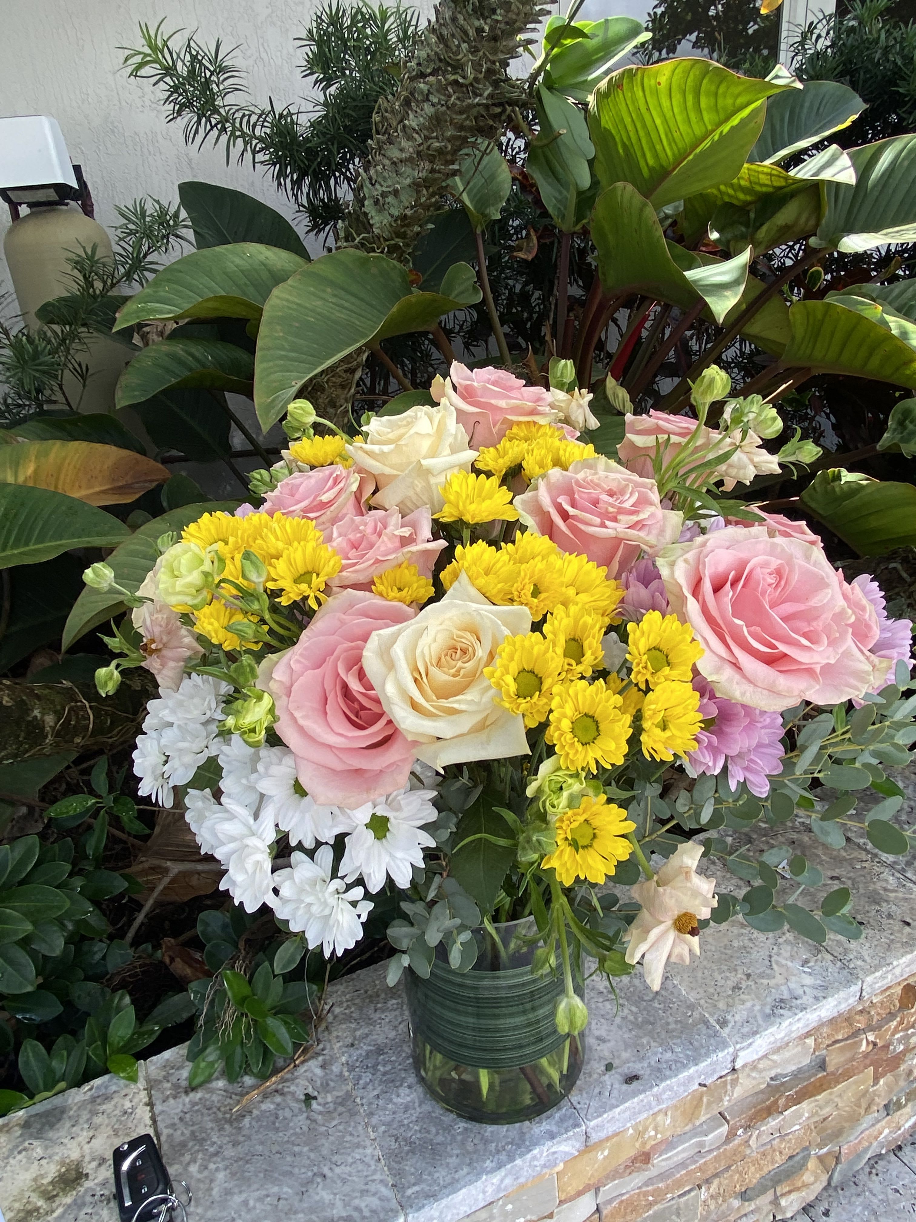 Colors of the Season  - Daisies, Roses, green in glass vase 