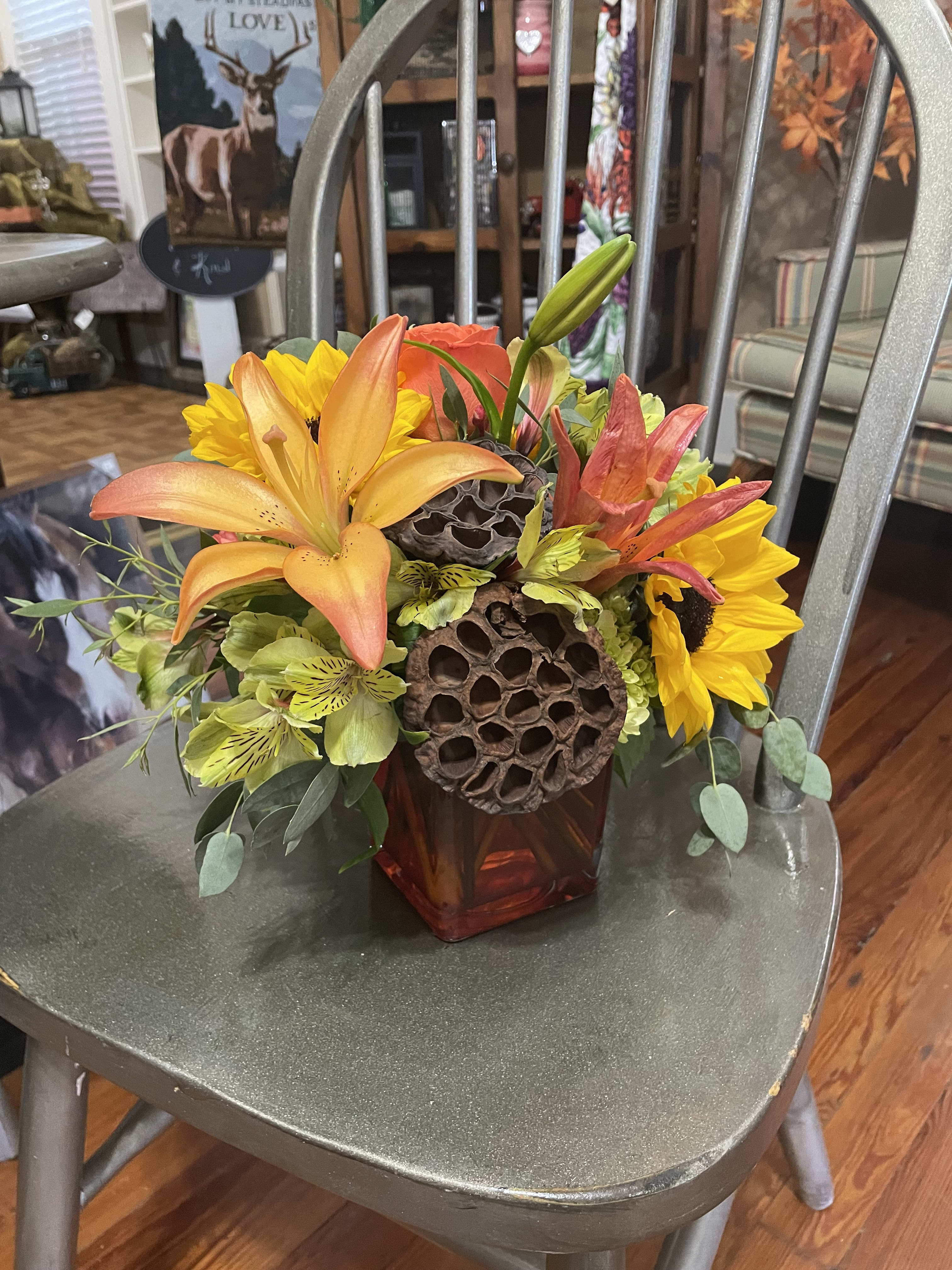 Autumn Glow Bouquet - Greet the new season with this heartwarming bouquet, presented in a cheerful cube vase.  Delivered in a yellow, red or orange cube.
