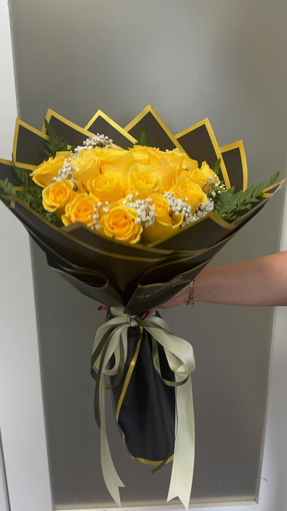 Yellow wrap roses  - Beautiful yellow roses are presented in a bouquet style wrap.