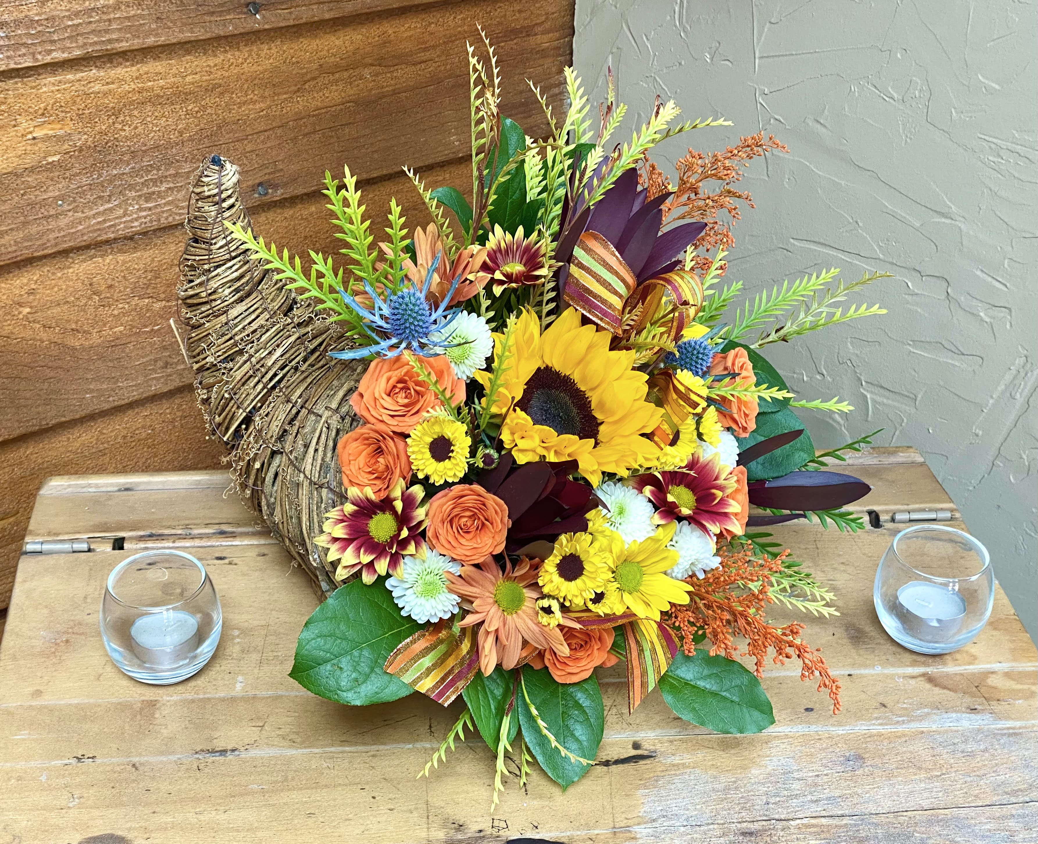 Petite and Oh So Sweet! Petite and Oh So Sweet! - Adorable cornucopia is just the perfect size for a buffet or table! Always the designer's choice on the freshest flowers available