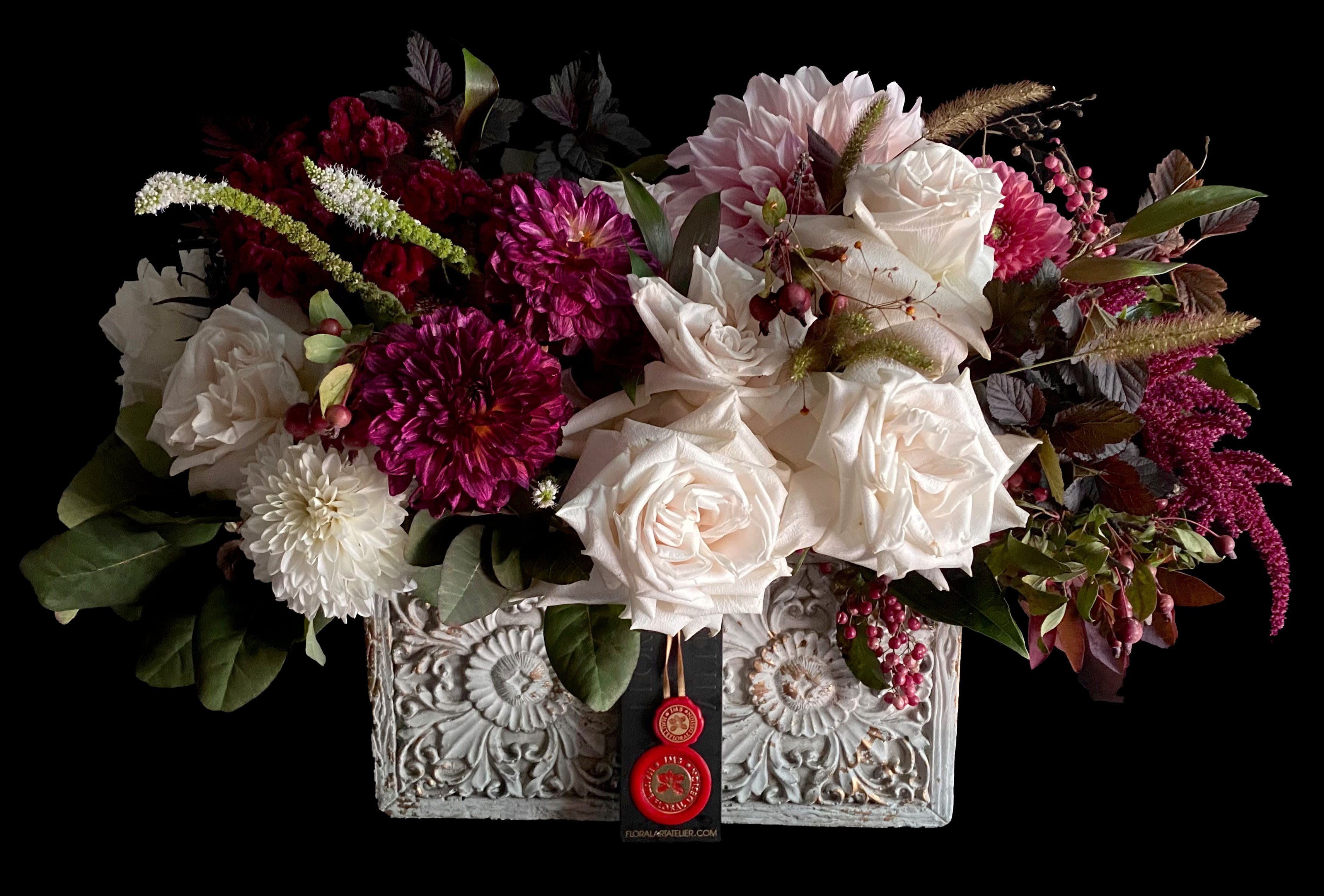 Blooms in Carved Off White Vase Blooms in Carved Off White Vase - Quantity of blooms depends on chosen price point. Pictured Premium.