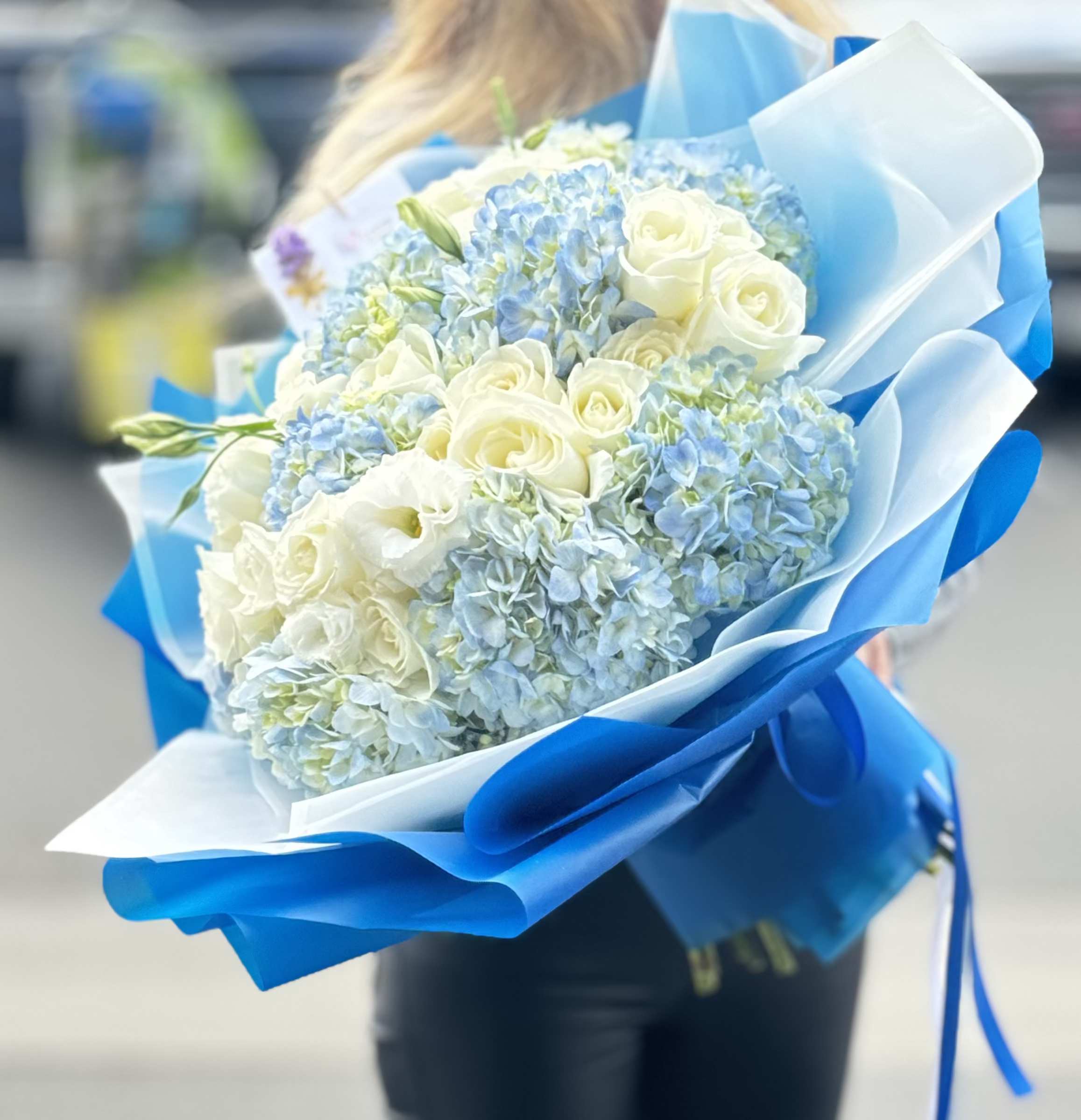 Light Hydrangea Bouquet Light Hydrangea Bouquet - Celebrate the arrival of a little one with this soft and elegant bouquet featuring light hydrangeas, roses, and delicate lisianthus. Wrapped in layered paper, this fresh floral arrangement is the perfect gift for a baby, baby shower, or newborn hospital delivery. This bouquet is available for same-day flower delivery in Los Angeles, Santa Monica, and Beverly Hills. Ideal for birth announcements, congratulations flowers, or welcoming a new chapter with grace and beauty.