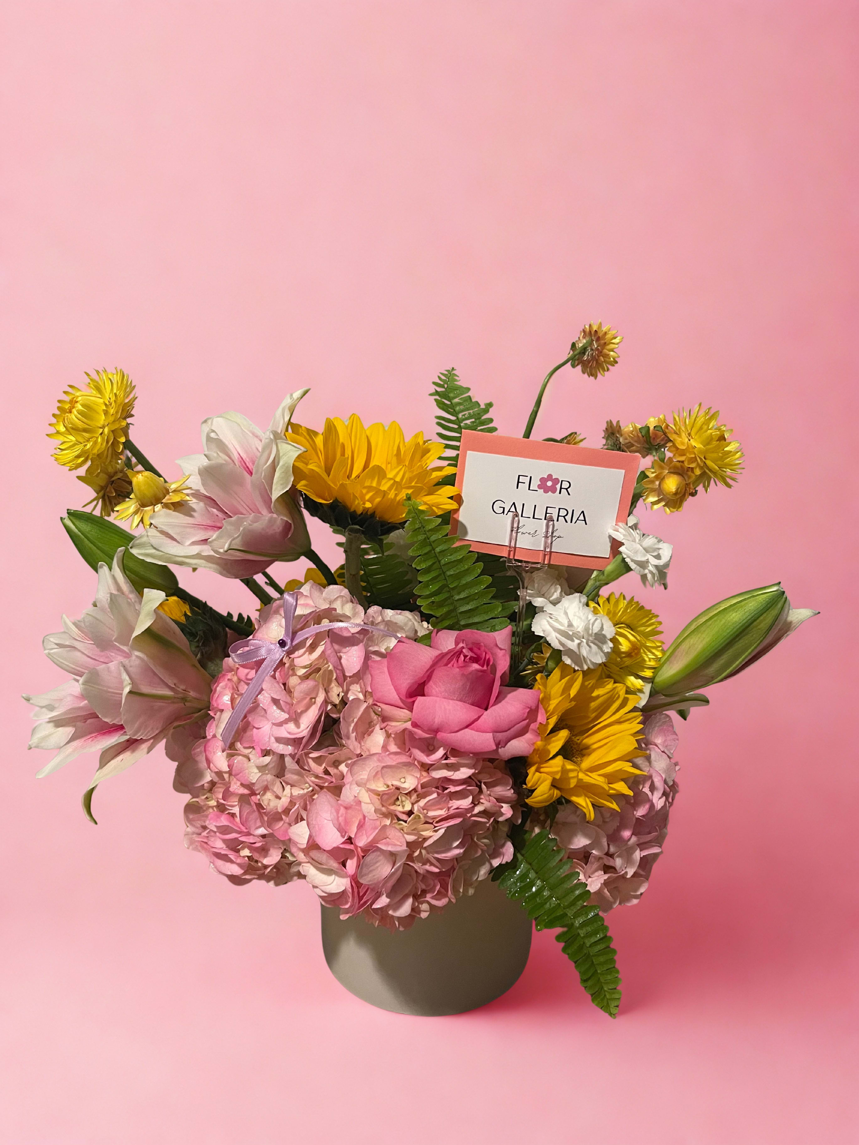 Hydrangea Dreams - Hydrangeas and mixed blooms in ceramic pot.