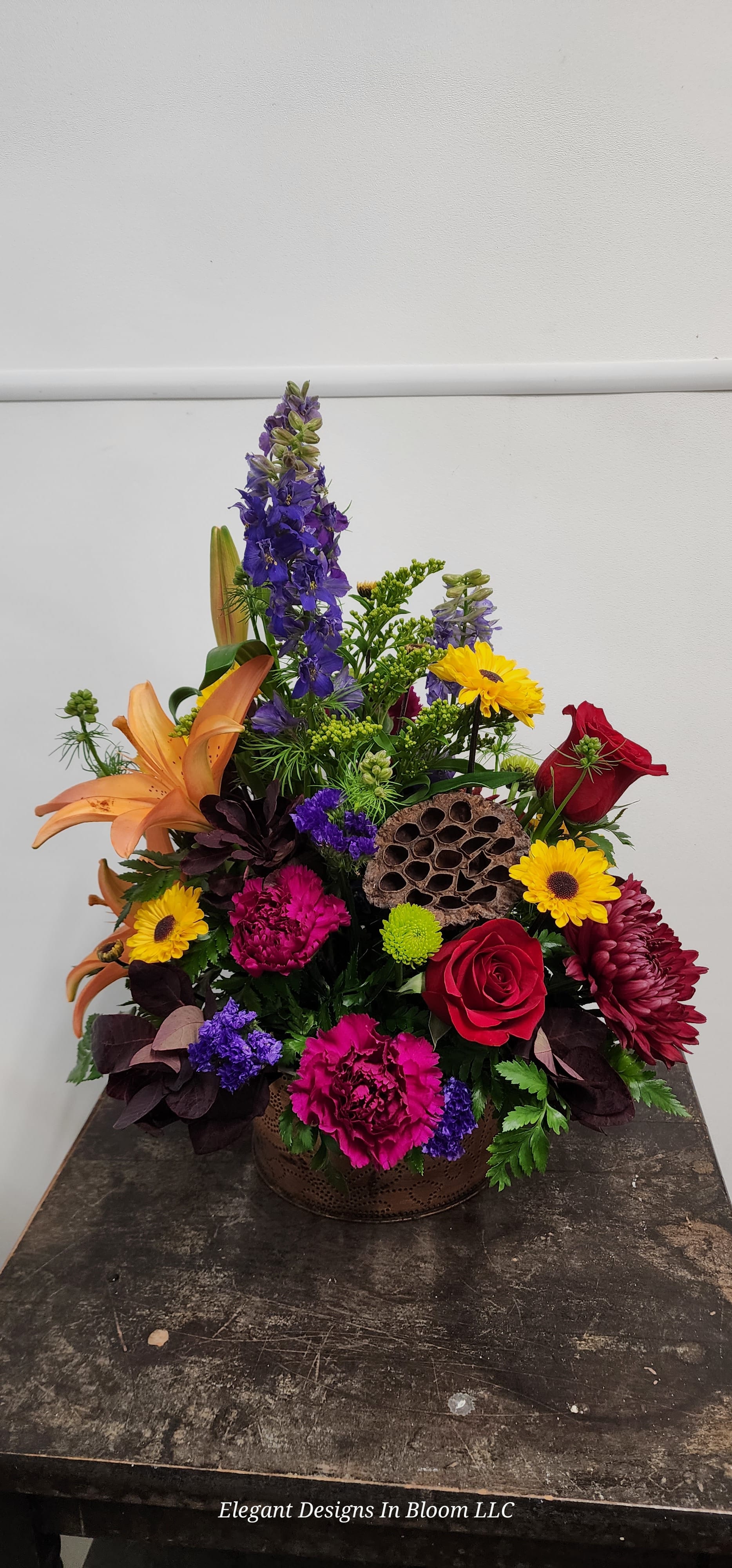 Designers Choice Thanksgiving Arrangement - Our Designers will create a one of a kind arrangement for you! Taller than our centerpieces these are great for an island, buffet, entryway, or the table 