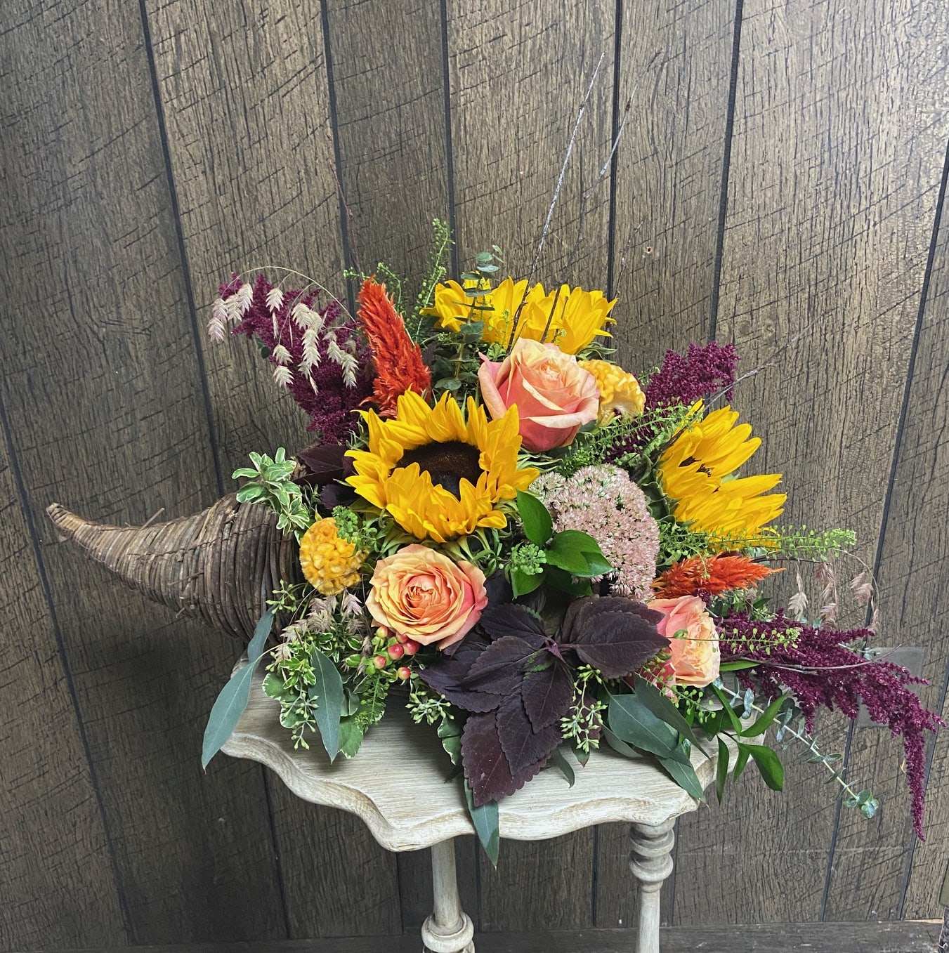 Fall Cornucopia Centerpiece - A 20&quot; long whicker cornucopia keepsake filled will fall foliage and flowers