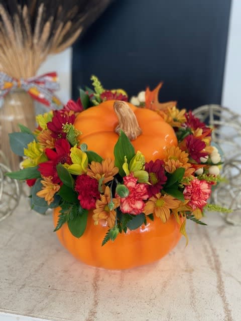 Welcome Fall - Ceramic  orange pumpkin, nice mix of long lasting fall colored flowers. 
