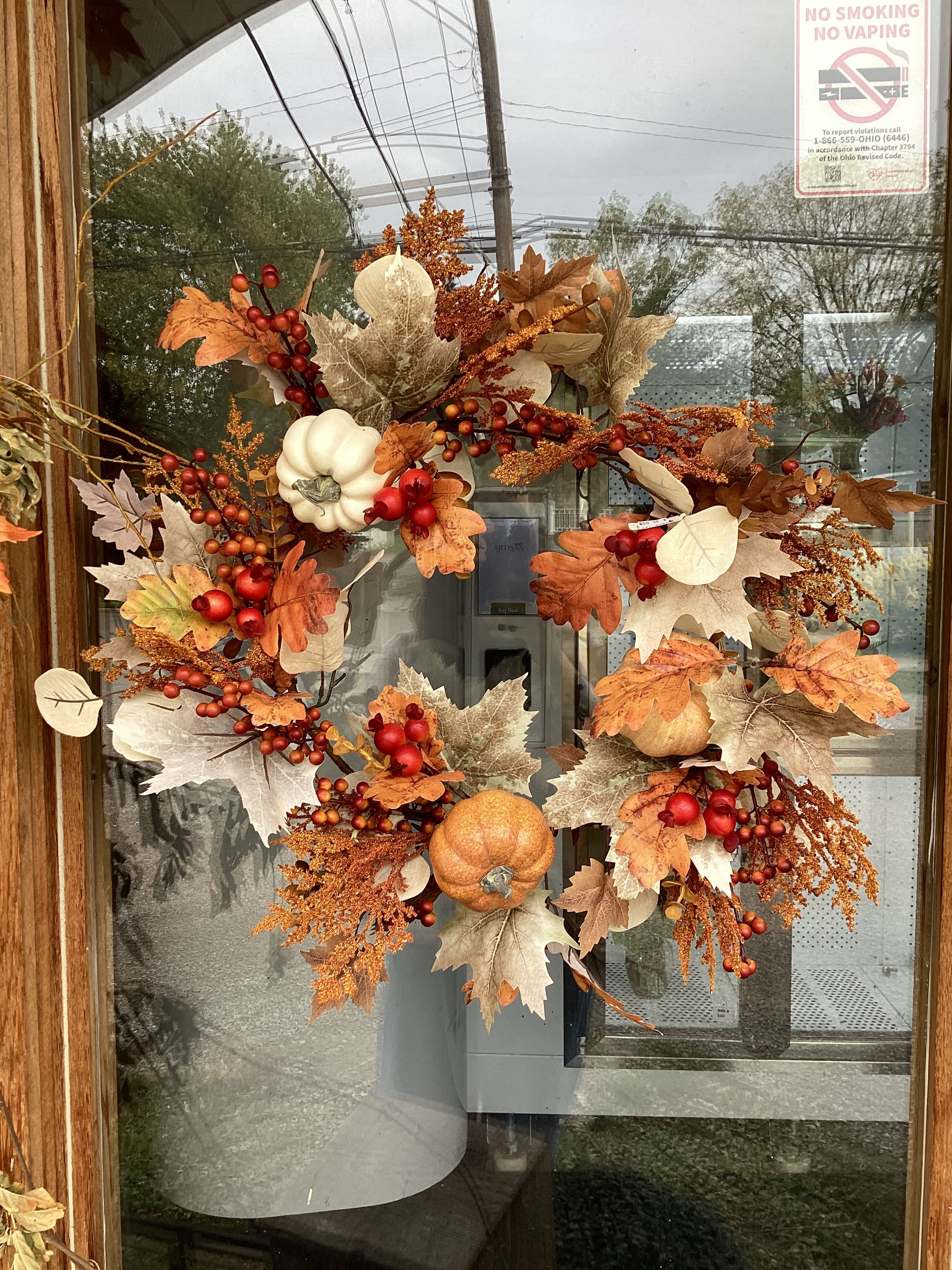 Autumn Leaf with Pumpkins Wreath - A wreath decorated with silk autumn leaves and pumpkins