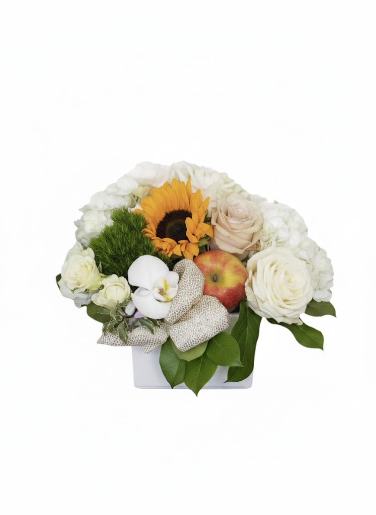 Make it Cozy  - An elegant arrangement featuring roses, spray roses , hydrangeas, berries, greenery .This arrangement would be a great gift for any occasion. Send it to celebrate somebody getting a new job, to your mom as a surprise gift, or to beat the winter doldrums.  