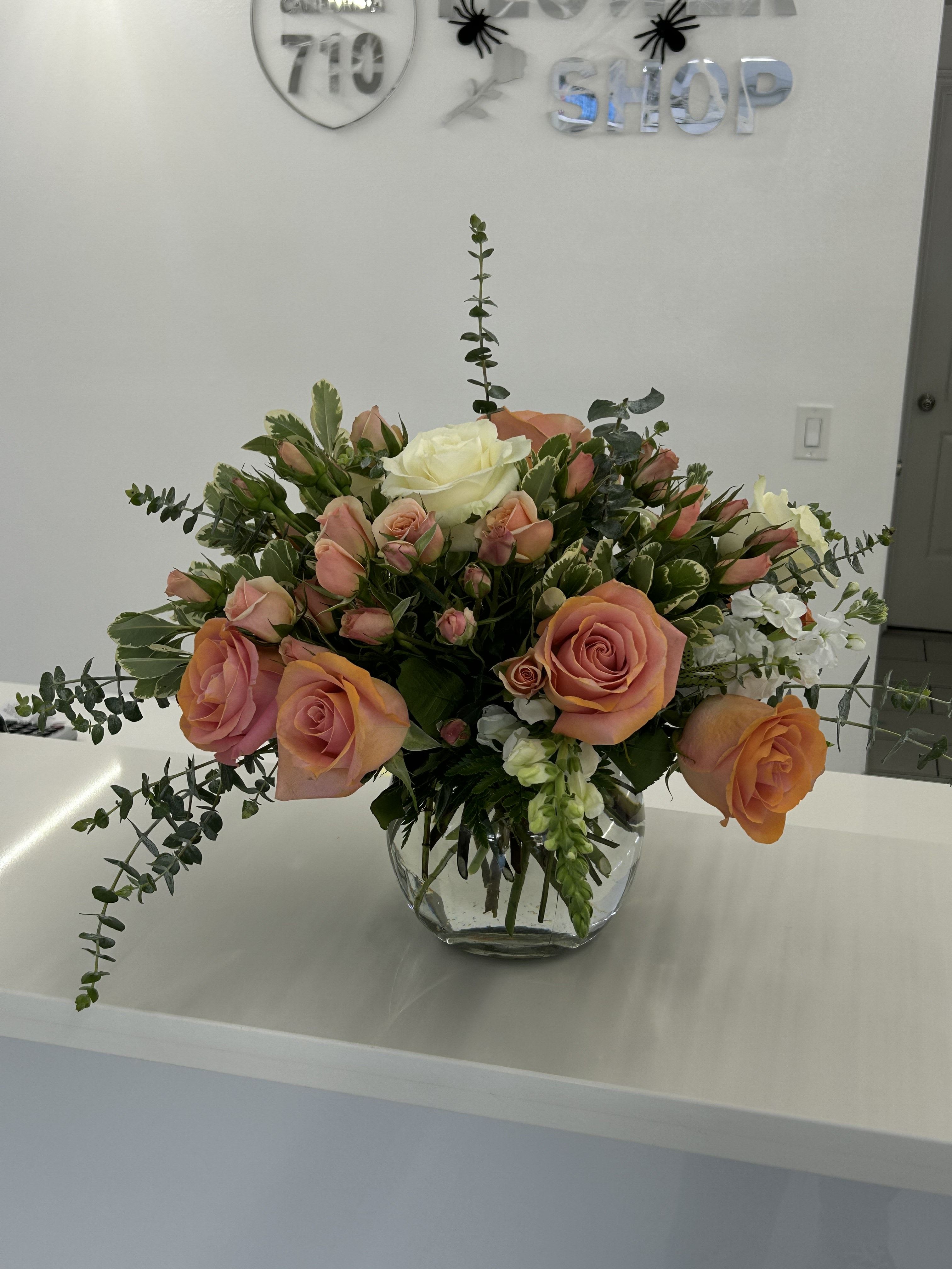 Peachy Perfection - A soft and elegant arrangement perfect for any occasion that calls for a touch of warmth and sophistication. (If some flowers and/or the vase are not available there will be minor substitutions.)