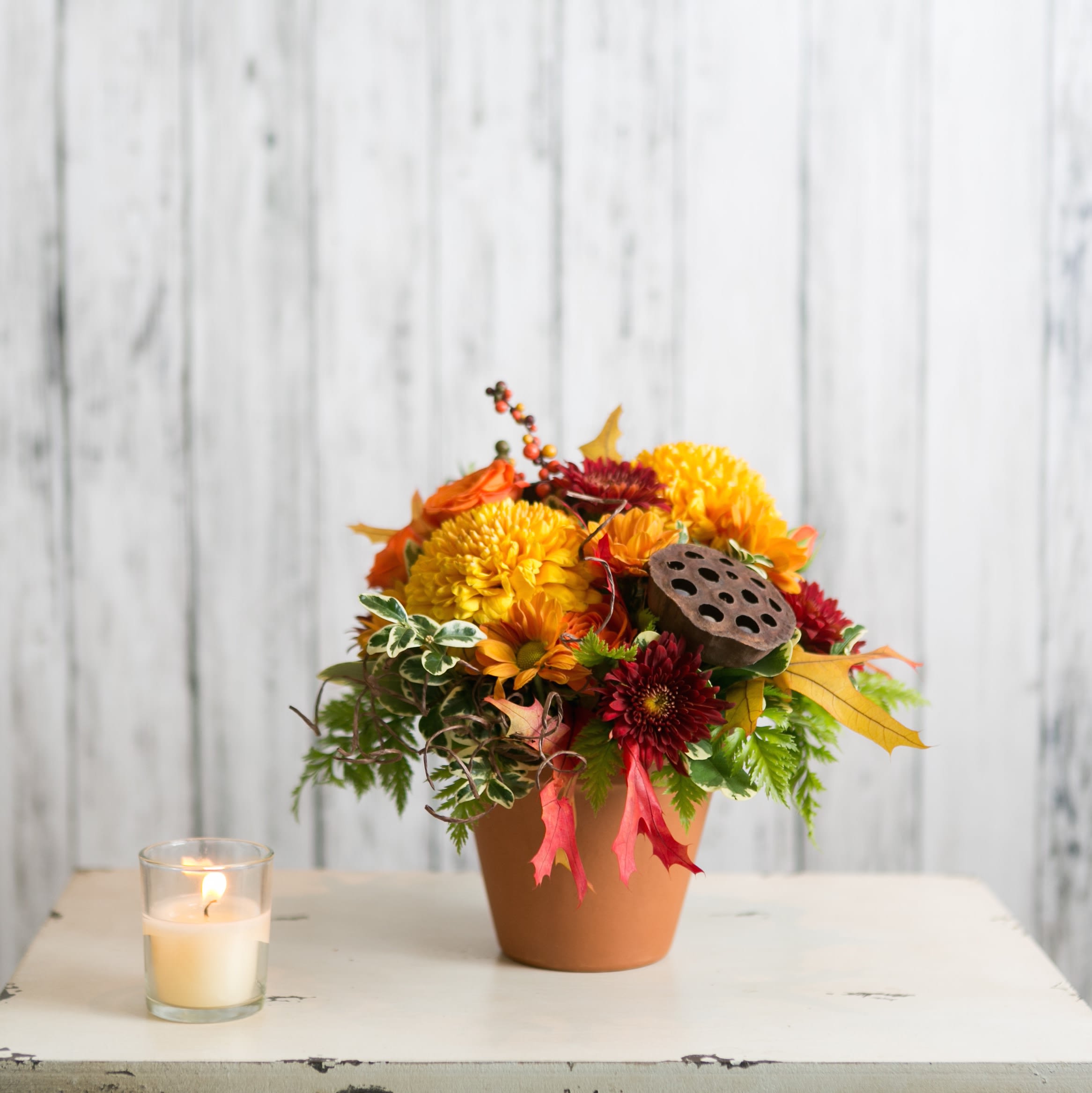 Autumn - Cute &amp; classic!  A terracotta pot is filled with long-lasting fall favorites.  The perfect size for a desk, dorm or kitchen!