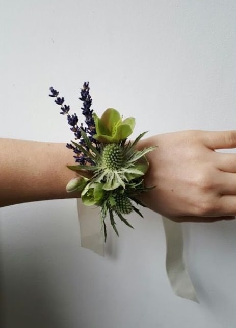 Custom Corsage - Please contact us before placing an order for a custom corsage. Prices will vary depending on the style and vibe you are wanting. Website prices reflect the average cost. Please call or email to discuss further details.  Flower Availability Changes Seasonally And Weekly Your Arrangement May Vary Slightly From The Photo, But Guarantee It Will Be Fresh, Stylish, And Beautiful.