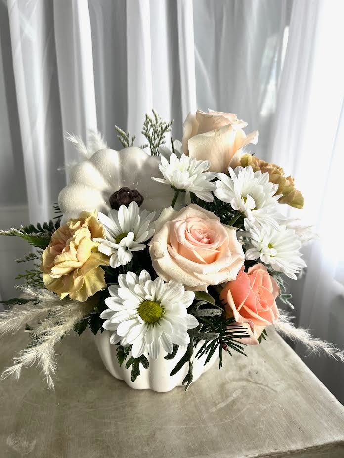 A Fall Chill in the Air A Fall Chill in the Air - A sweet and subtle tribute ...the suns white rays softly hit the clouds and create a peachy hue.  As always, call the shop to find out what we have in stock because our inventory always is different, and we may have to substitute.