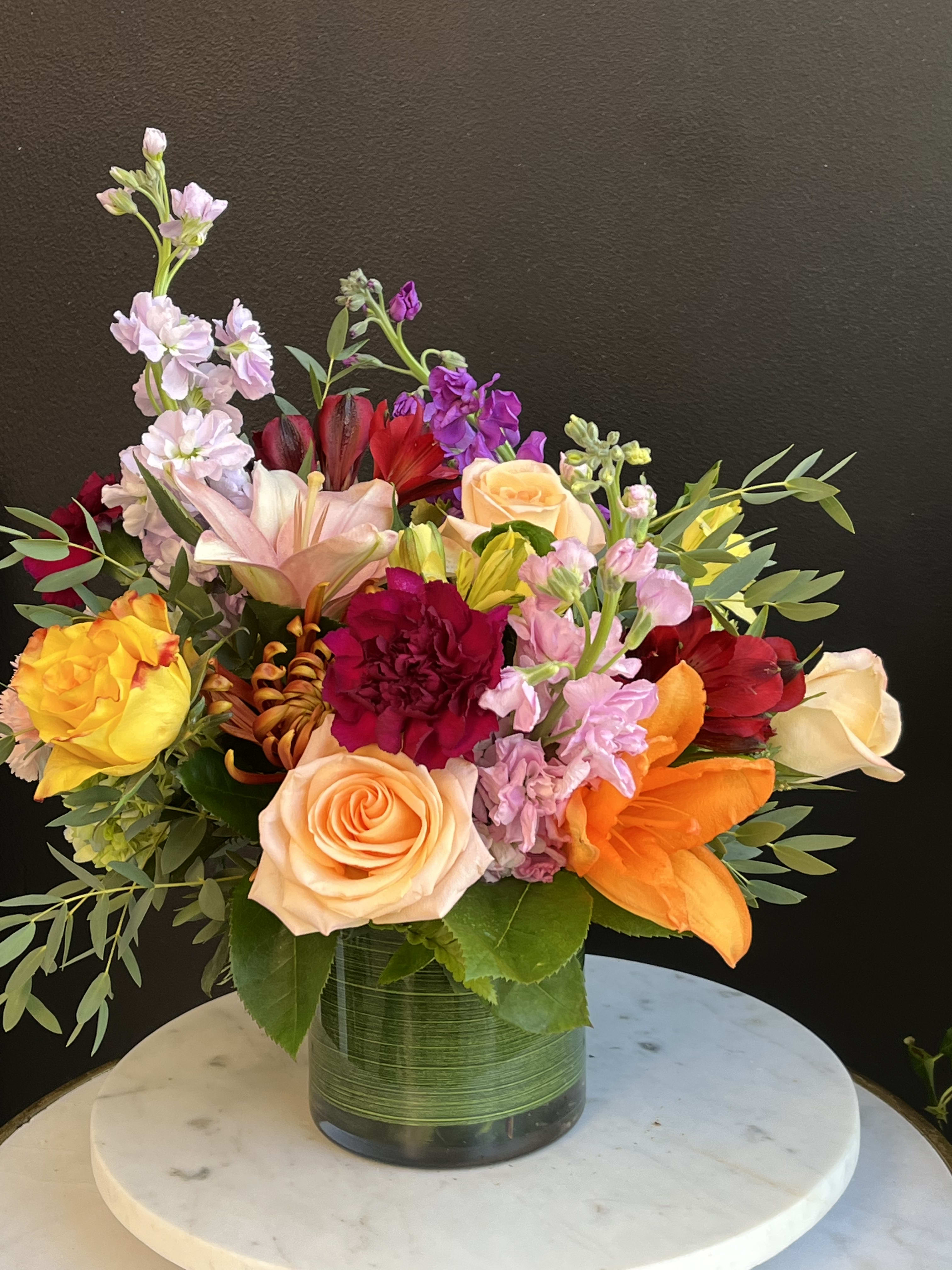 Fall For You - Send this fresh arrangement during the Fall season. Mixed with late Summer to Fall blooms. A warm delight for any occasion. 