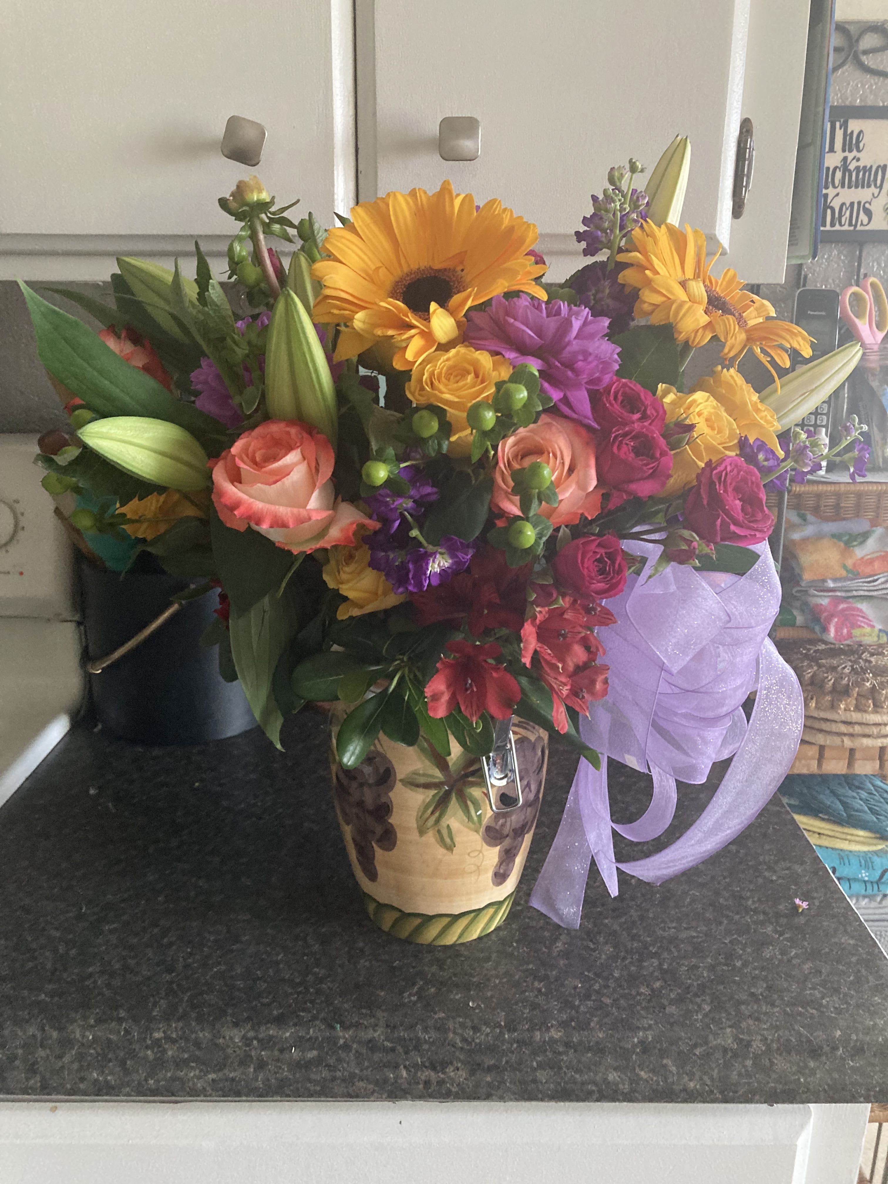 Jar full of flowers - Seasonal blooms in a custom jar