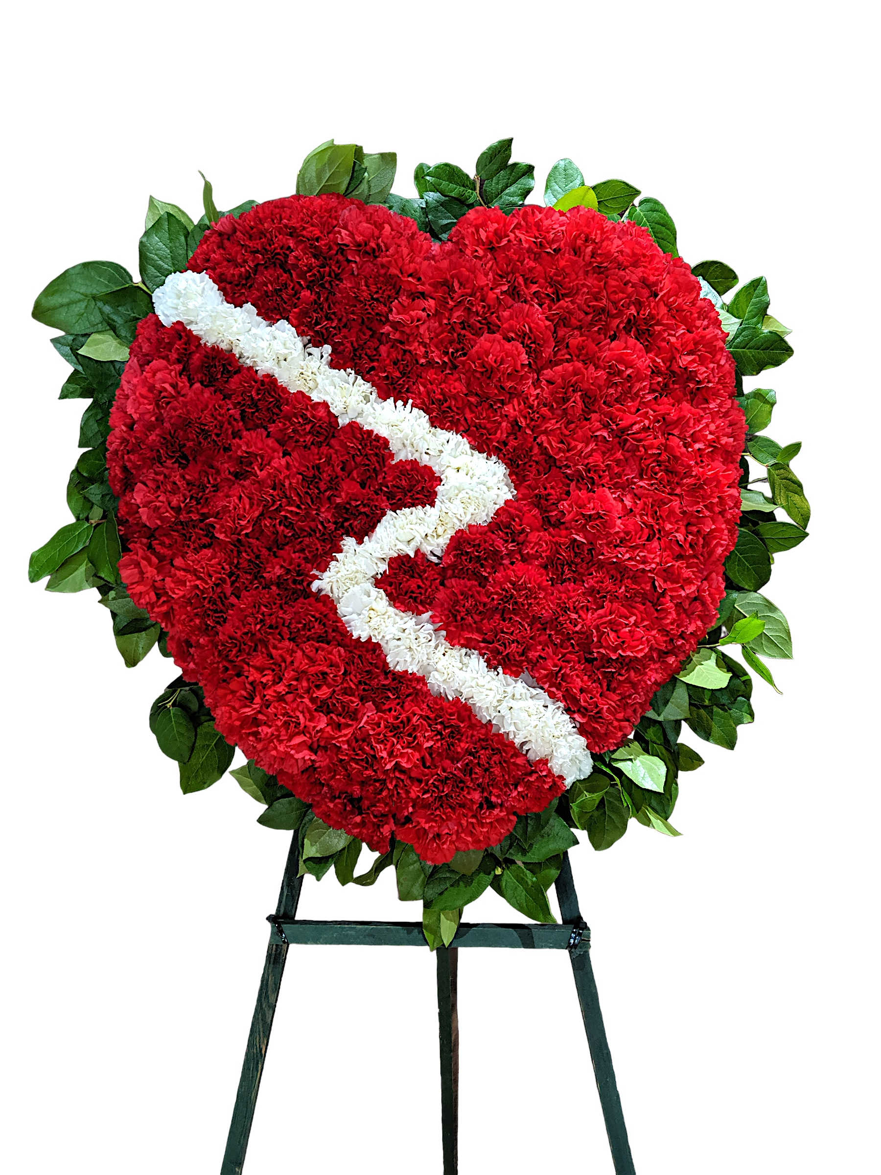 Eternal Love Wreath Eternal Love Wreath - Heart shaped wreath filled with bright red carnations and a lightning bolt design with white carnations. This beautiful wreath is wrapped with Lemon Leaf around the edges. This type of design is usually approximately 5 - 6 ft tall and is meant for funeral services ONLY. This design includes a free banner (please include a banner sign in the Special Instruction Box or Message Box with the title “BANNER”). In the event a banner space is left blank for any reason, ONLY a card message will be included. Banners are printed in a black 2.5-inch wide ribbon with silver ink. Currently, we don't offer any other colors. If the service is the same day as the order was placed we cannot guarantee delivery by a certain time. And flowers will be delivered during normal business hours. To ensure the delivered flowers match the displayed photo as close as possible we recommend ordering 3-5 days in advance. For the same or next day deliveries, we reserve a right to substitute flowers with the same or greater value.