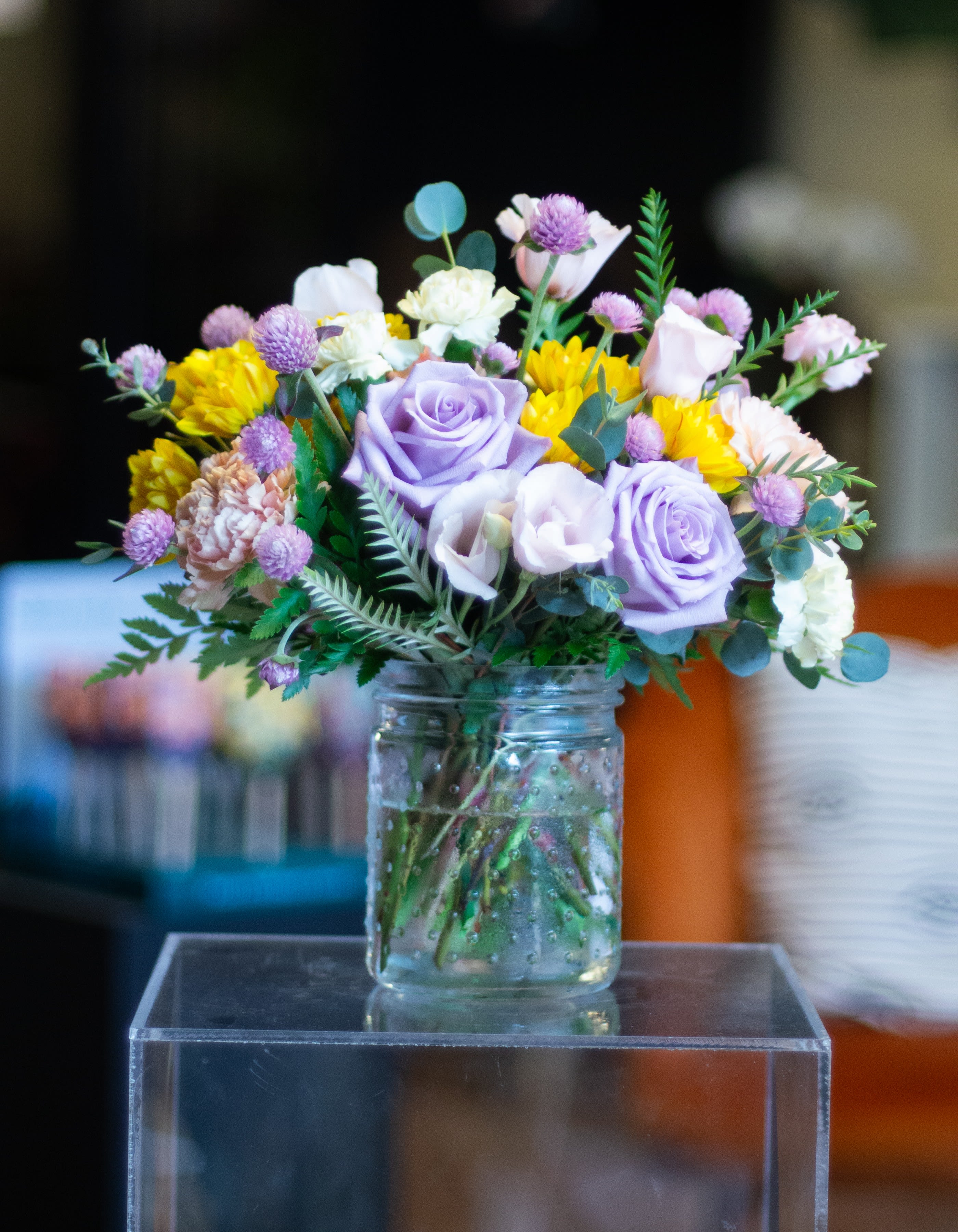 Mini Designer's Choice Arrangement - This compact arrangement is designer's choice, left in the hands of Poppy + Pot's lead floral designer and color composition wizard, Da'Reen Reichenberg. These arrangements are made in fun and interesting glass containers.