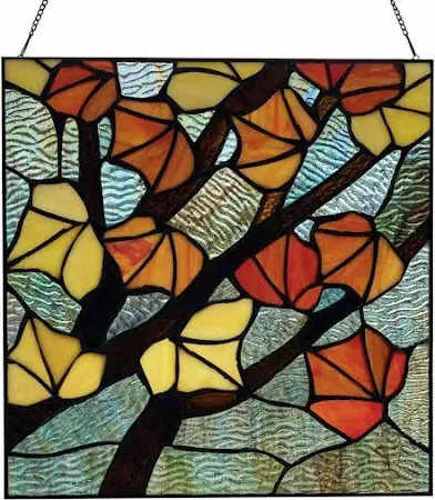 Oranges Leaves in Autumn - Stained glass panel with autumn leaves in shades of orange, available at Cerulean Arts.  Designed with 99 individual pieces of both textured and brightly hued glass soldered together using the copper foil method.  Includes chain for hanging.  12&quot; H x 12&quot; W 