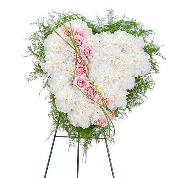 Tears Of Roses Tears Of Roses - A sweet white heart of white carnations with roses to symbolize the tears you shed over the loss of your loved one.