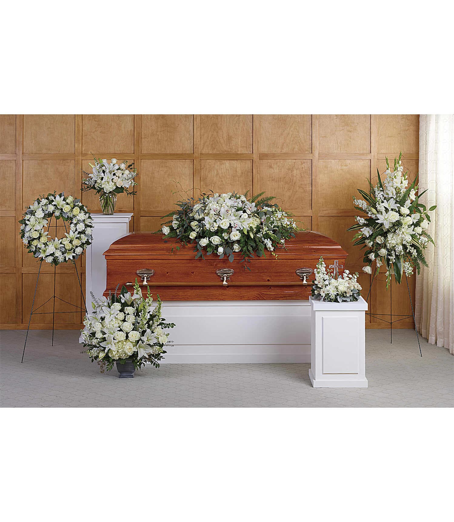 Grandest Glory Collection Grandest Glory Collection - Rest easy knowing that your loved one will be cherished in our Grandest Glory Casket Spray, Heartfelt Sympathy spray, or Serenity Wreath. You can also convey their sense of peace with the True Horizon bouquet DX and Divine Peace Bunch - all hand-crafted by us here at A Daisy A Day! 1 grandest glory casket spray, T281-2A 1 heartfelt sympathy spray, T281-3A 1 serenity wreath, T239-3A 1 true horizon bouquet DX, T281-4B 1 divine peace bouquet DX, T229-2B 1 dream from the heart bouquet DX, T208-1B Please note: Flower varieties and colors may be substituted based on seasonal and daily availability. We always ensure your arrangement is of equal or greater value and just as beautiful.