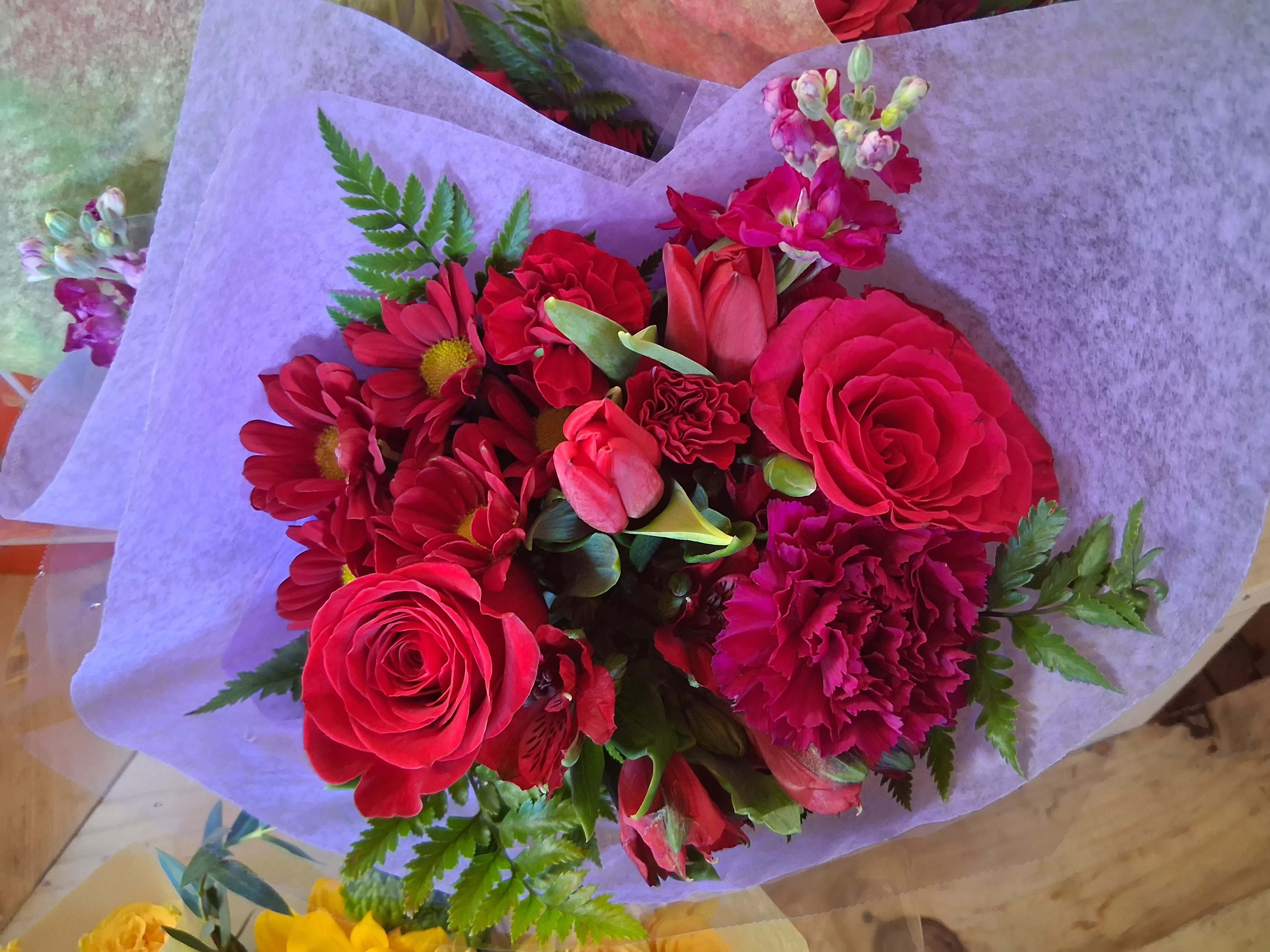 Ruby - &quot;Ready to go&quot; series hand tied bouquet - Fresh and beautiful all red hand tied wrap with tulips, roses, daisies, carnations and alstroemeria