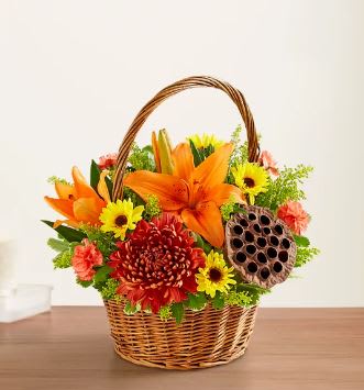 Peace, Prayers &amp; Blessings Fall - We find comfort in caring words and kind gestures during times of loss. Offer your own thoughtful expression with our lovely basket arrangement in warm autumn colors. Designed by expert local florists, this touching tribute will help convey all the love in your heart. **BASKET WILL VARY**