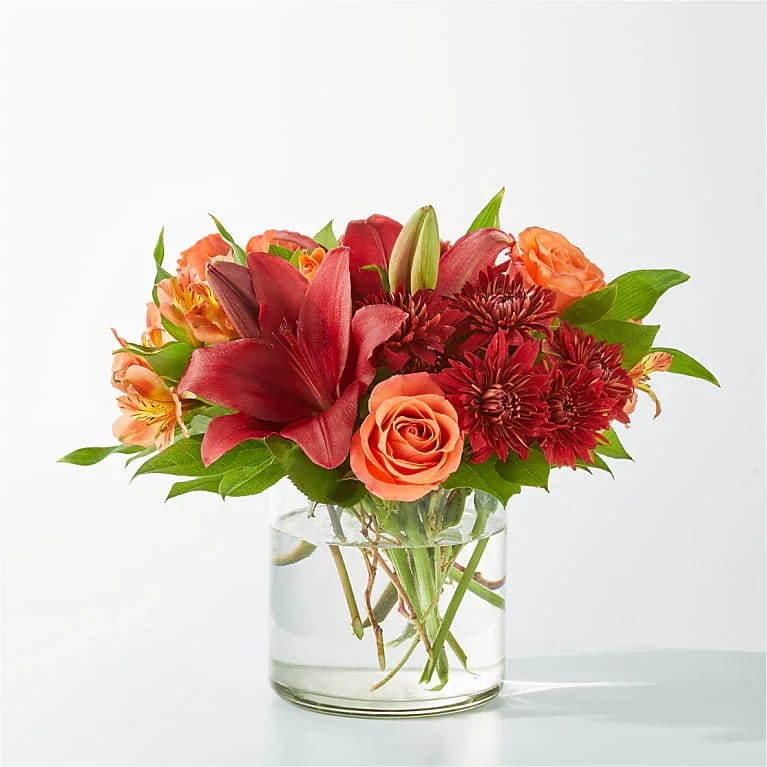Crimson Leaves Bouquet - Capturing the colors of fall foliage, the Crimson Leaves Bouquet is an eye-catching mix of deep reds and oranges, sure to add a smile to your recipient’s day. 