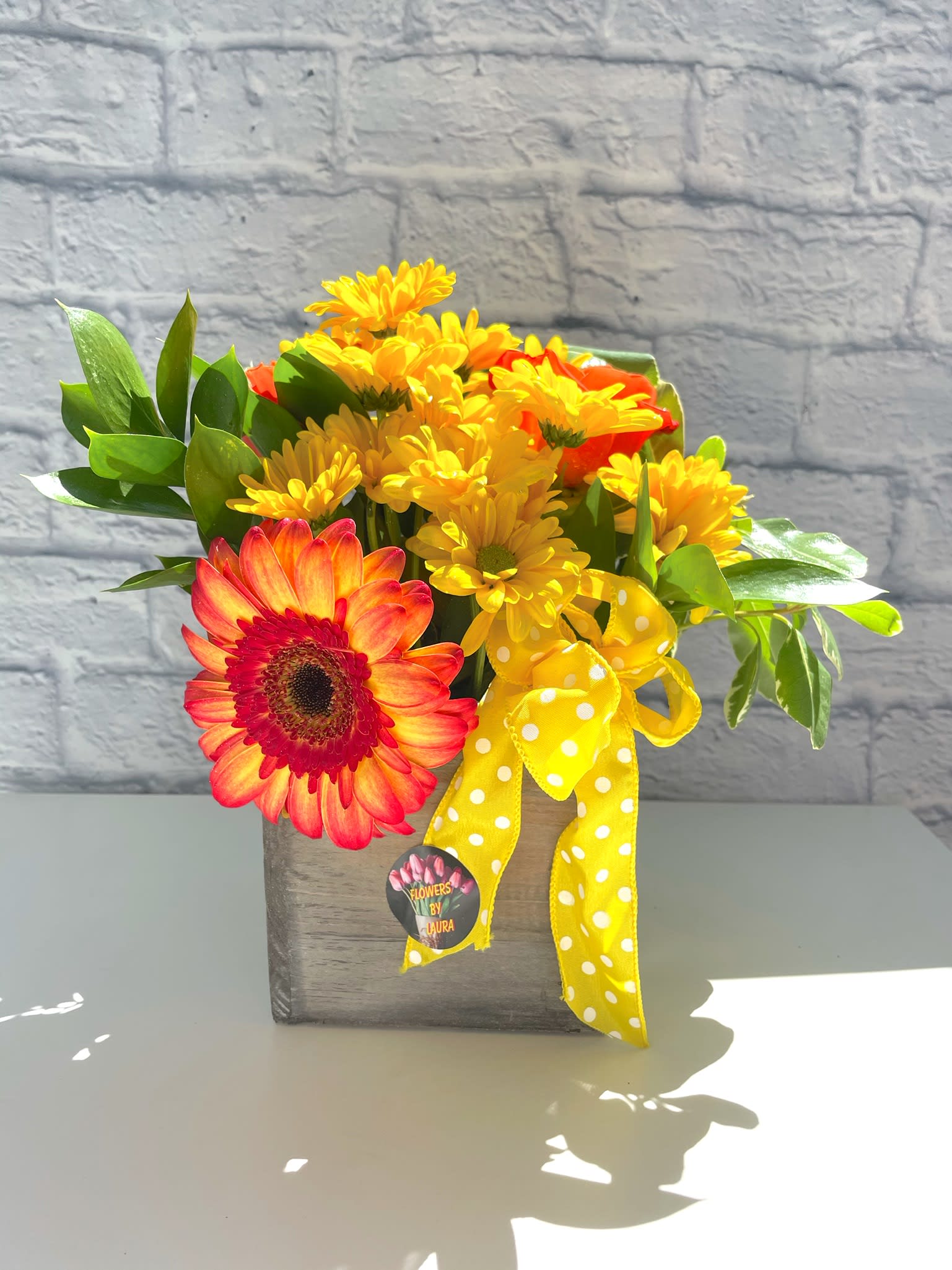 Sunrise - An assortment of Gerber Daisy's, Sunflowers, and other mixed flowers.