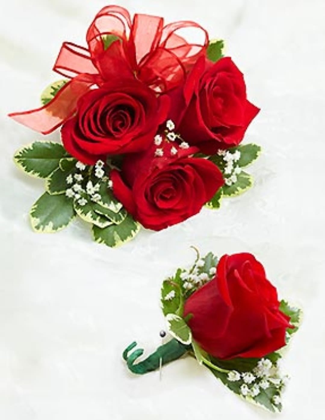 Combo red rose corsage and Boutineer - This wrist red roses wrist corsage also comes with a red rose boutineer to compliment each other.