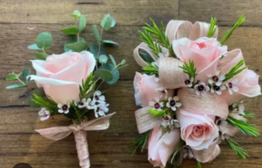 Pastel pink rose corsage and boutineer combo - This combo is pastel pink roses in a wrist corsage and a boutineer for the perfect date!