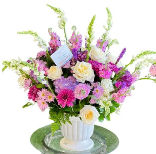 Heartfelt Condolences - A stunning tribute to express your heartfelt condolences. This elegant arrangement features a harmonious palette of colors for your loved ones.  Includes: Roses, Daisies, Snapdragon, Hydrangeas, Carnation, Assorted Stock, Big Vase.