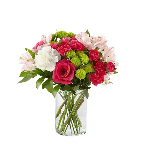 Rosy Garden - Arrangement in a glass vase includes hot pink roses, hot pink mini carnations, white carnations, pink astromelias, green pompon button and greenery.