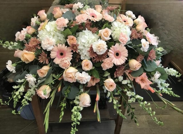 Casket Spray with Euclayptus with Peach Flowers Casket Spray with Euclayptus with Peach Flowers - Eucalyptus and Beautiful Flowers of the peach colors