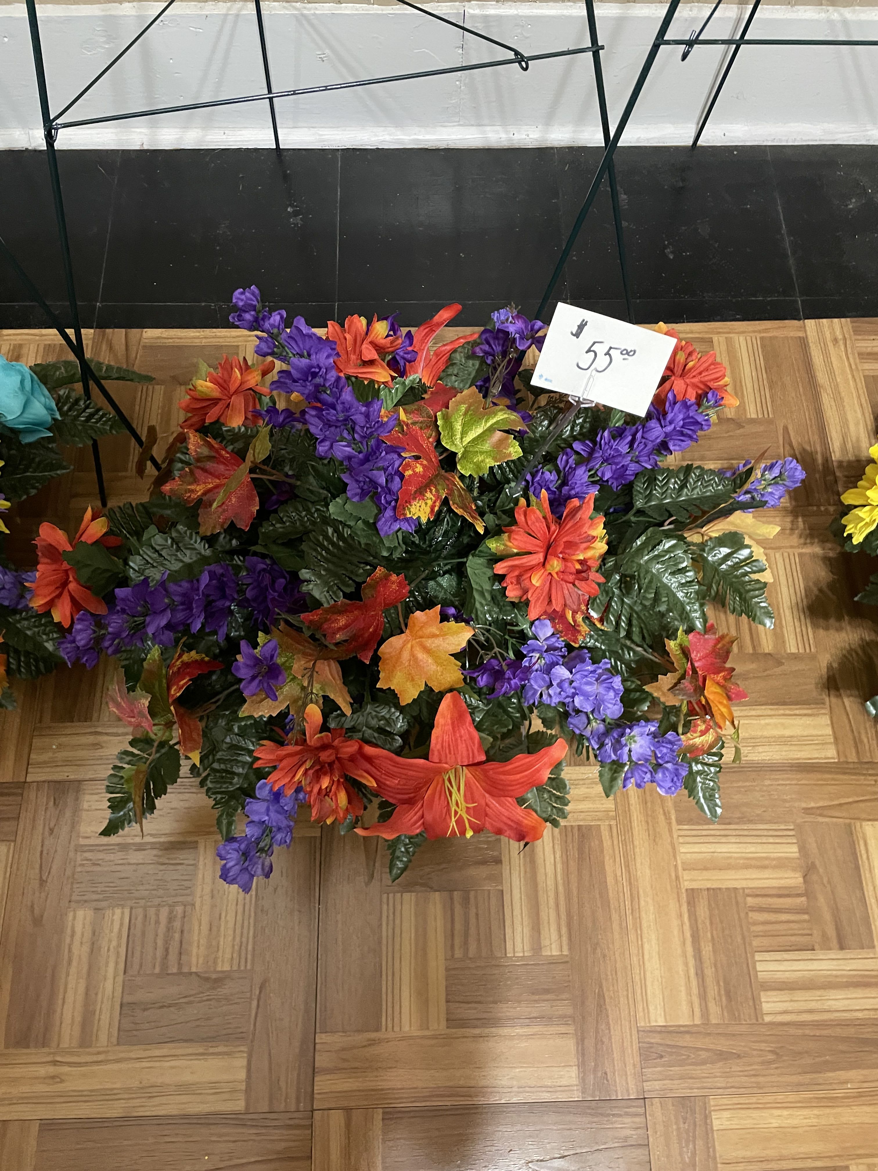 Mix Cemetery Saddle Mix Cemetery Saddle - This large cemetery saddle is made of mixed fall flowers in mixed shades ,will be put on a stand for service. We can design saddles for the cemetery in any colors you choose. Available for pick up or we offer delivery to the cemetery.