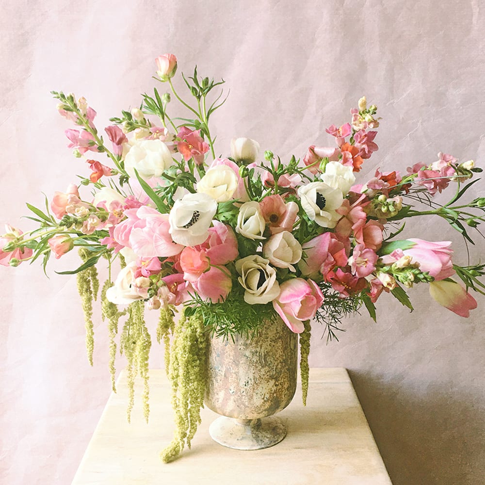 Avery (Gallery Photo) - Send these gorgeous blooms to add beauty to anyone's day! Anemones, tulips and butterfly ranunculus are gathered in an artful way to capture the spirit of romance!