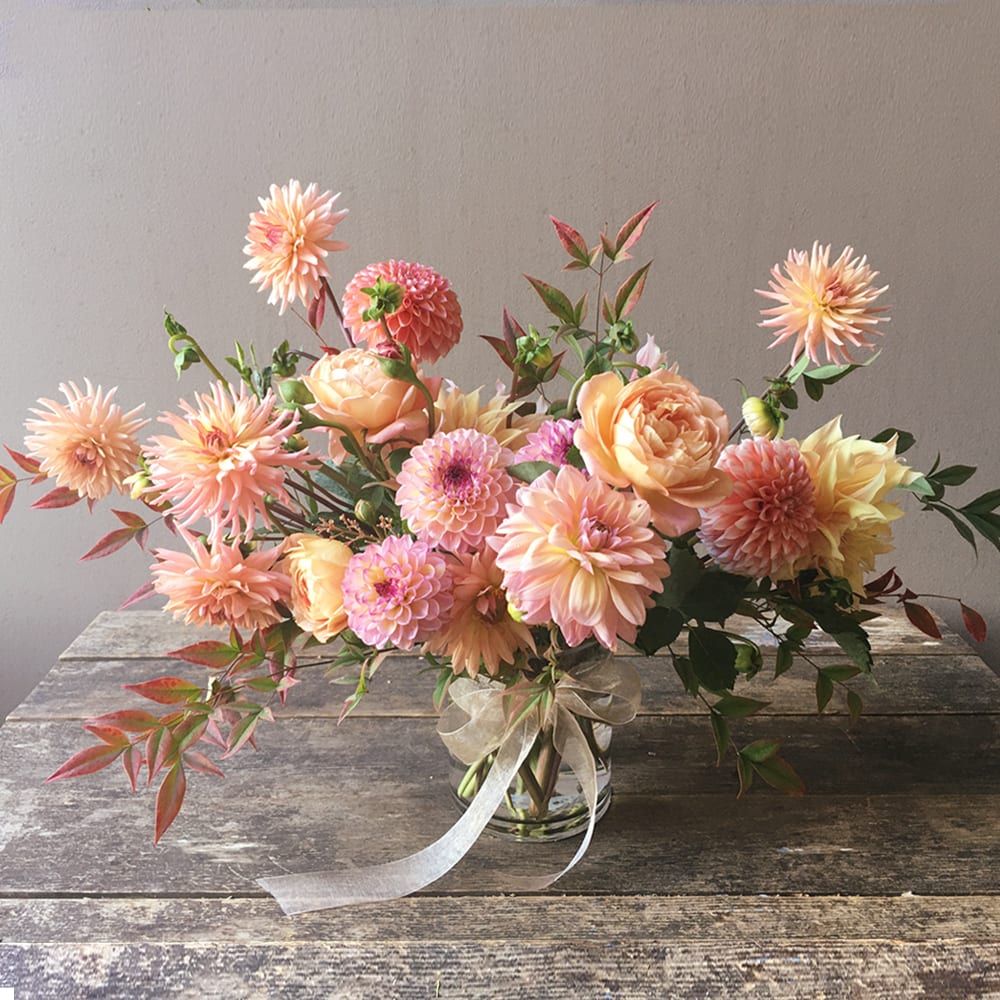 Faye (Gallery Photo) - A simply beautiful, peachy bouquet! This painterly floral design with gorgeous garden roses and dahlias are artfully gathered to bring joy and delight to anyone's day!