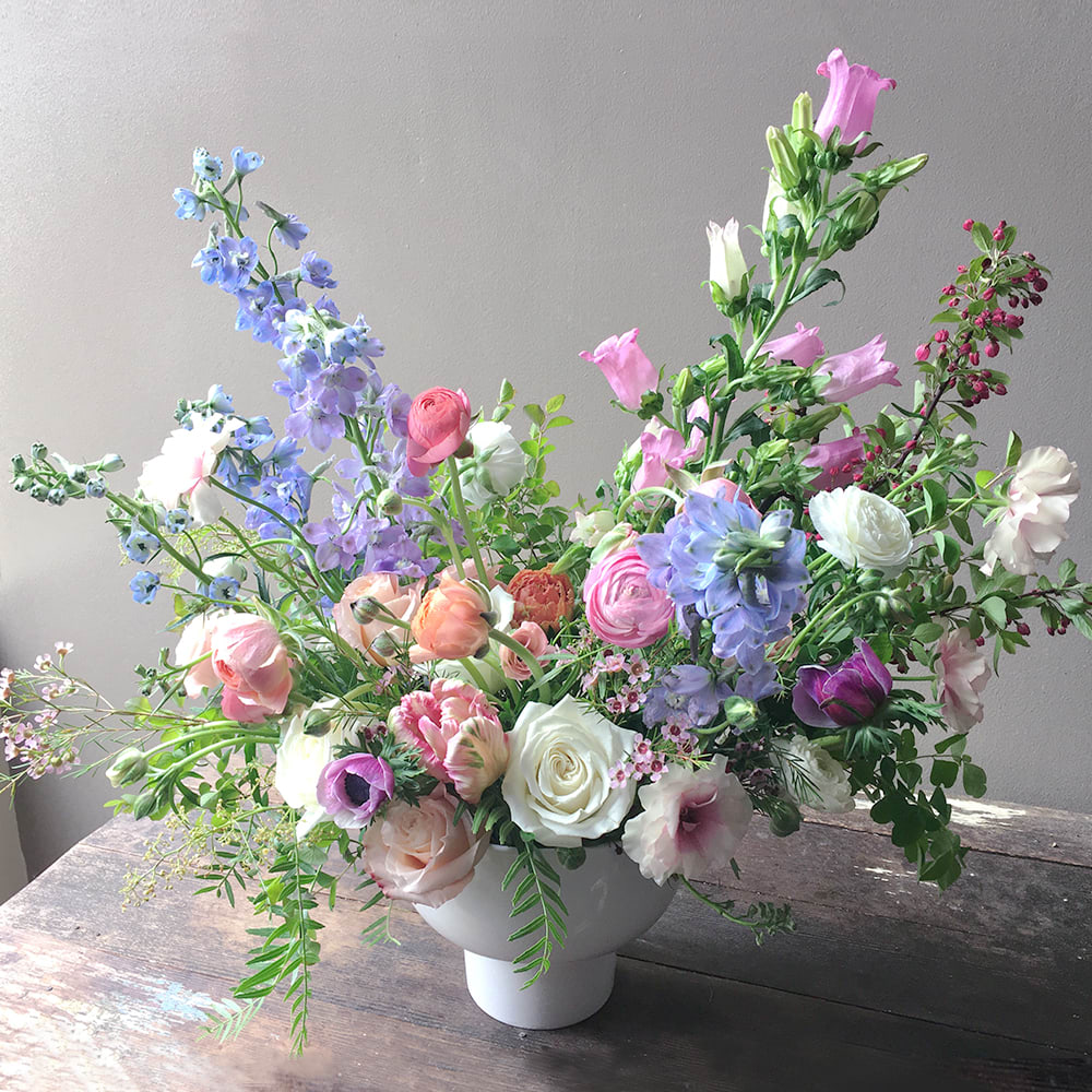 Nole (Gallery Photo) - Send this artful, soft romance filled with light to your loved one and let them be touched with nature's beauty! So much painterly botanical details in this floral design to be enjoyed!