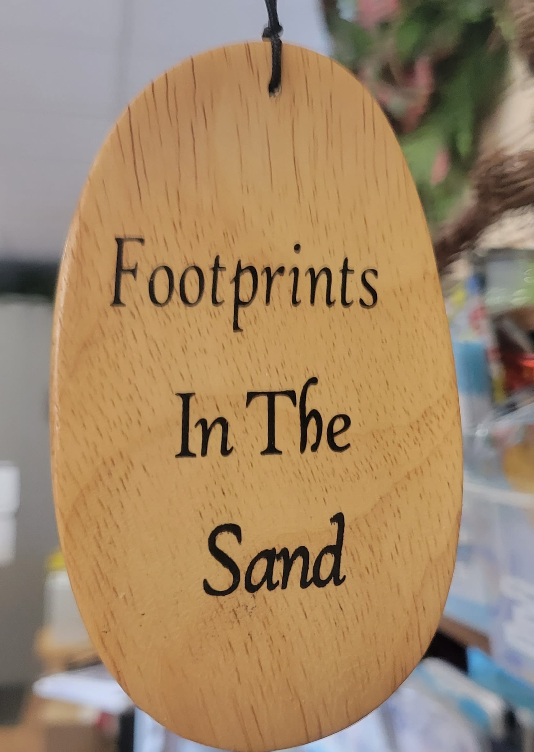 Footprints Wind Chime - Footprints In The Sand 40&quot; Silver Wind Chime  Message on Chimes: “Footprints In The Sand It Was Then That You Carried Me”   Message on Wind Catcher: “Footprints In The Sand&quot; Specifications: 4.5&quot; x 40&quot; Height • Hand crafted from durable and weather resistant anodized aluminum, finished in ash wood • Hand-tuned to provide superior tones and resonance • 5 tubes, 13/16” diameter each • 2” hook for easy hanging • 40” length from the top of the gathering ring to the bottom of the wind catcher  Please note pictures are representation of product. Actual silk topper will vary based on season and availability.