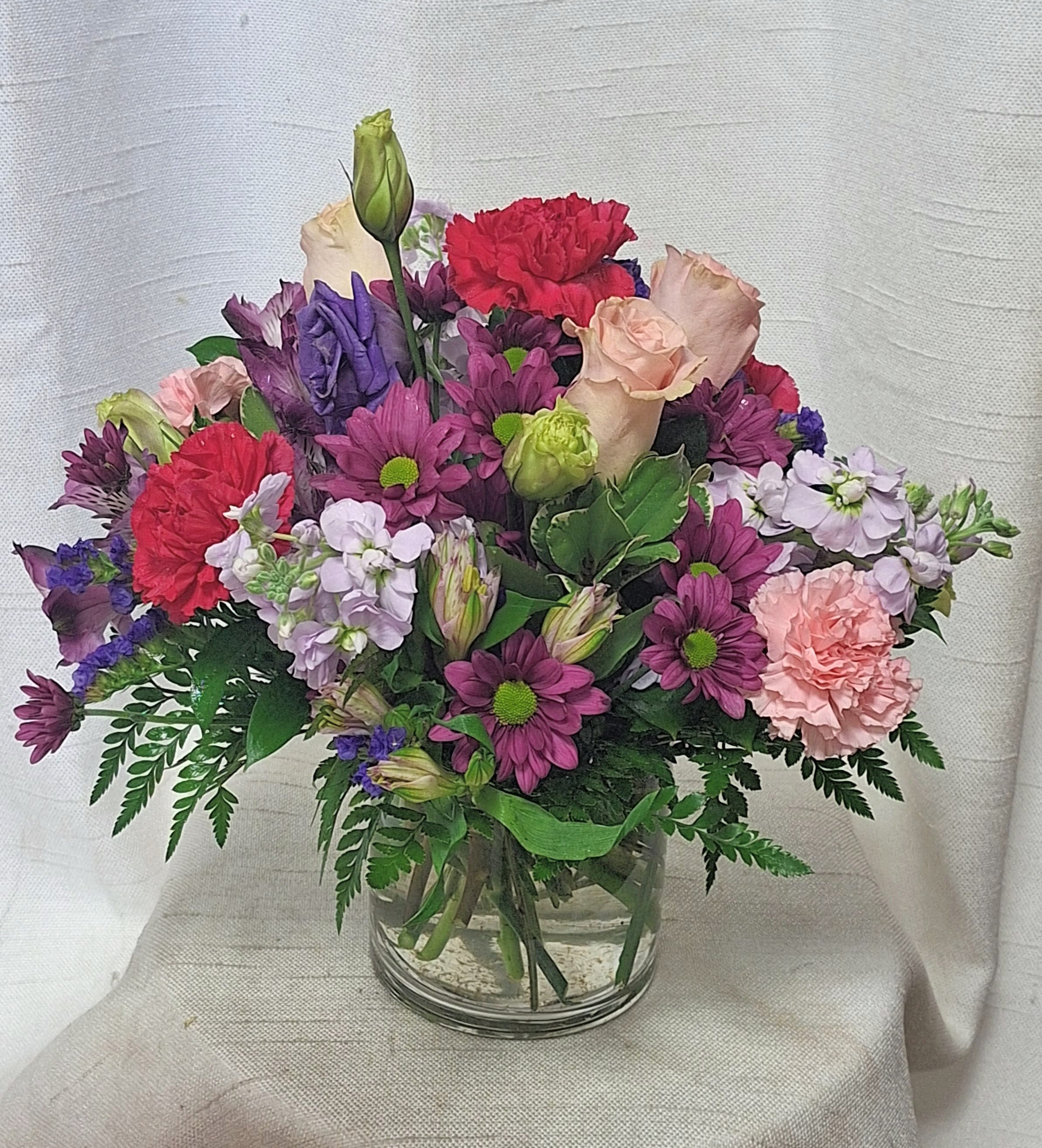 Sugary Bliss (BR) - Tell your recipient they are the sweetest with a bouquet composed of jewel–toned florals, like blooming roses, sweet alstroemeria, fragrant stock, and more.  